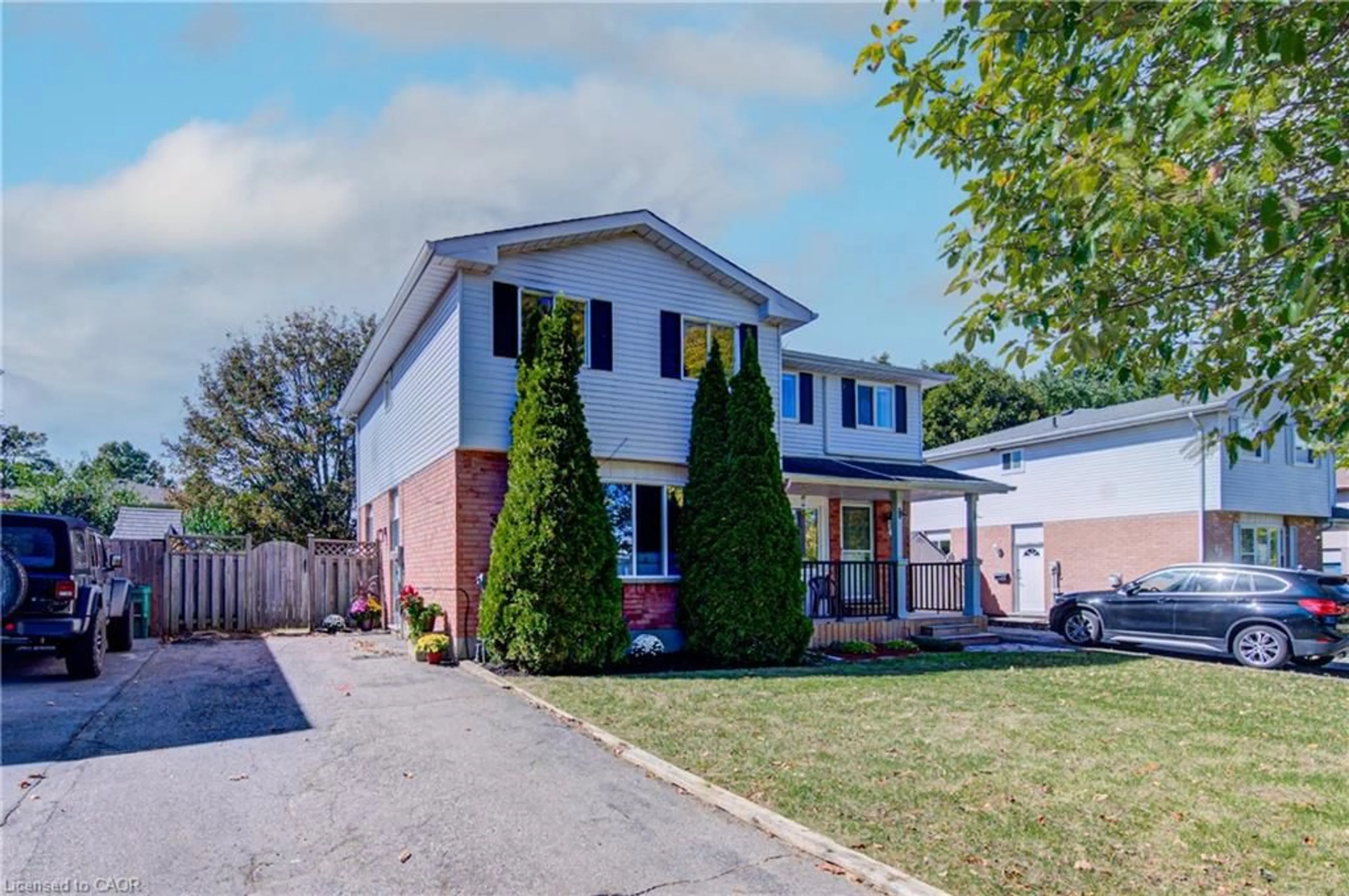 Home with brick exterior material, street for 39 Connelly Dr, Kitchener Ontario N2N 2T7