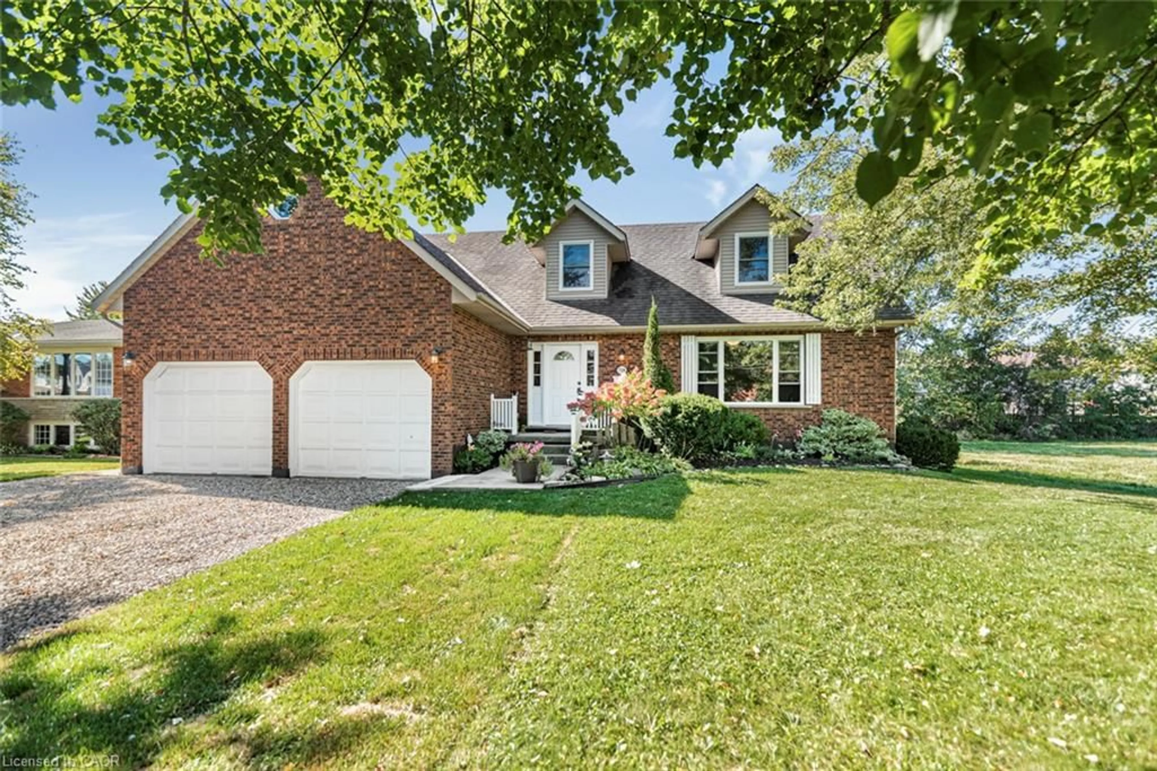 Home with brick exterior material, street for 714 Cross St, Dunnville Ontario N1A 1N7