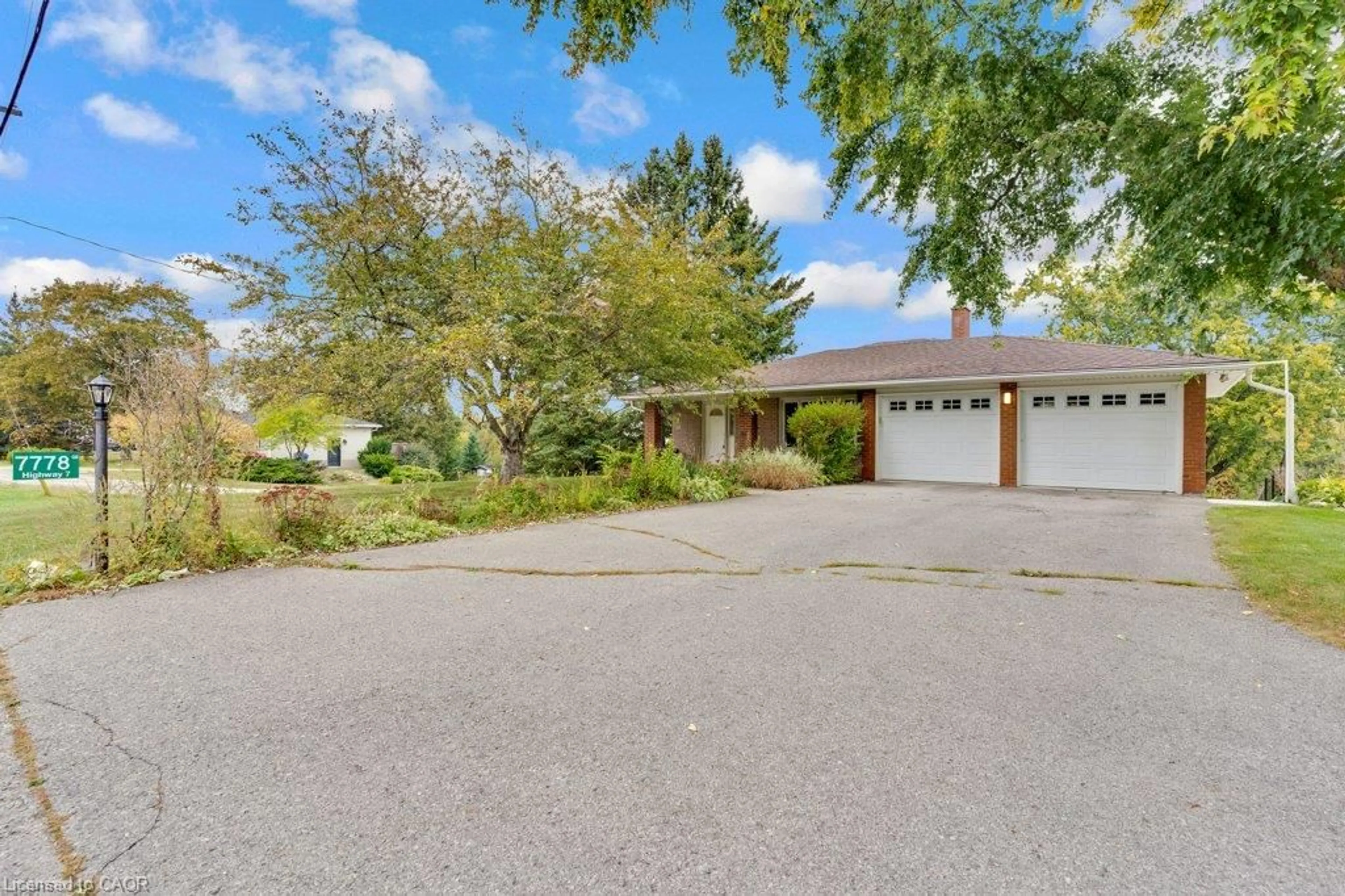 A pic from outside/outdoor area/front of a property/back of a property/a pic from drone, street for 7778 Highway 7, Guelph Ontario N1H 6H8
