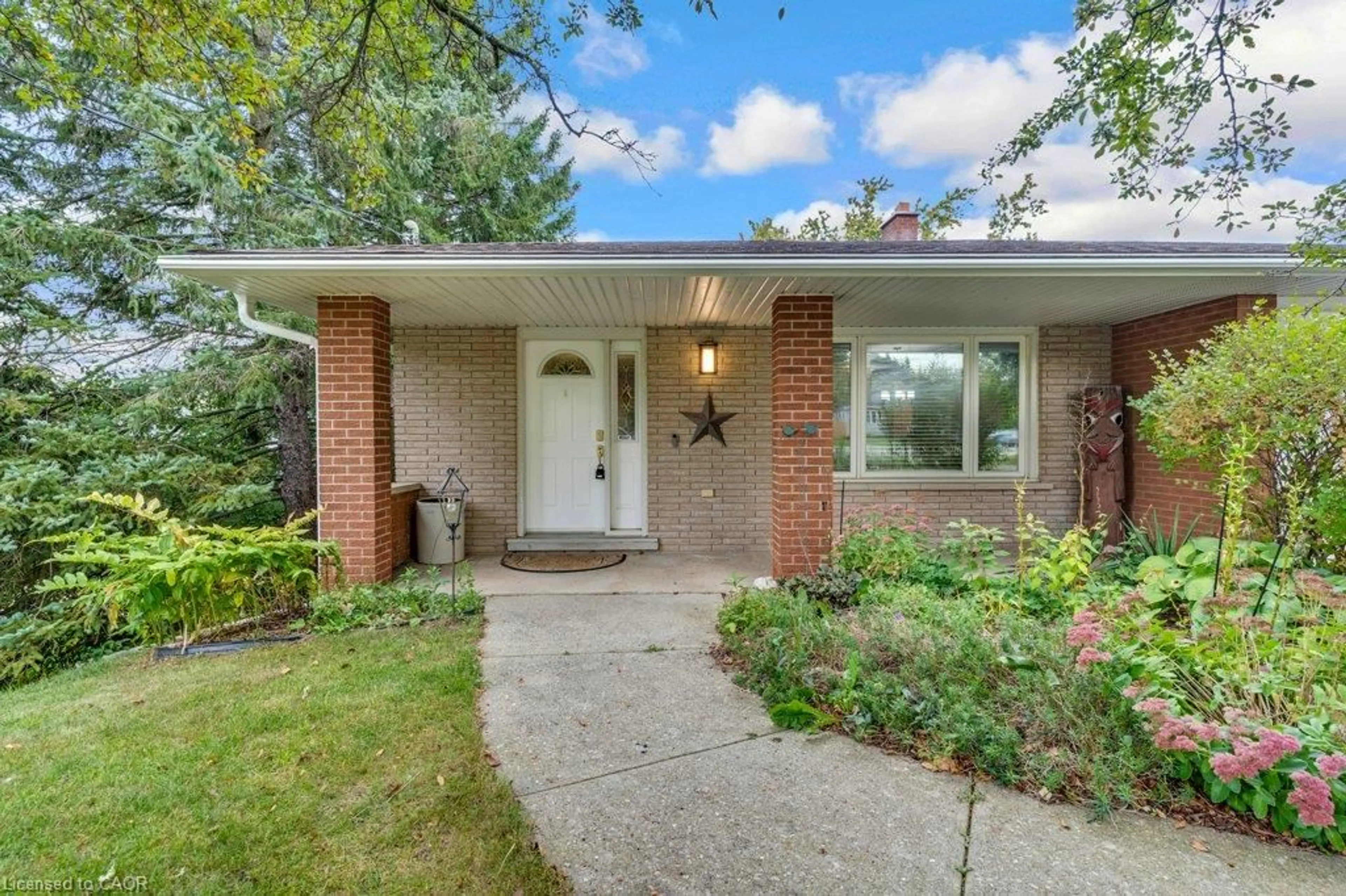 Home with brick exterior material, street for 7778 Highway 7, Guelph Ontario N1H 6H8
