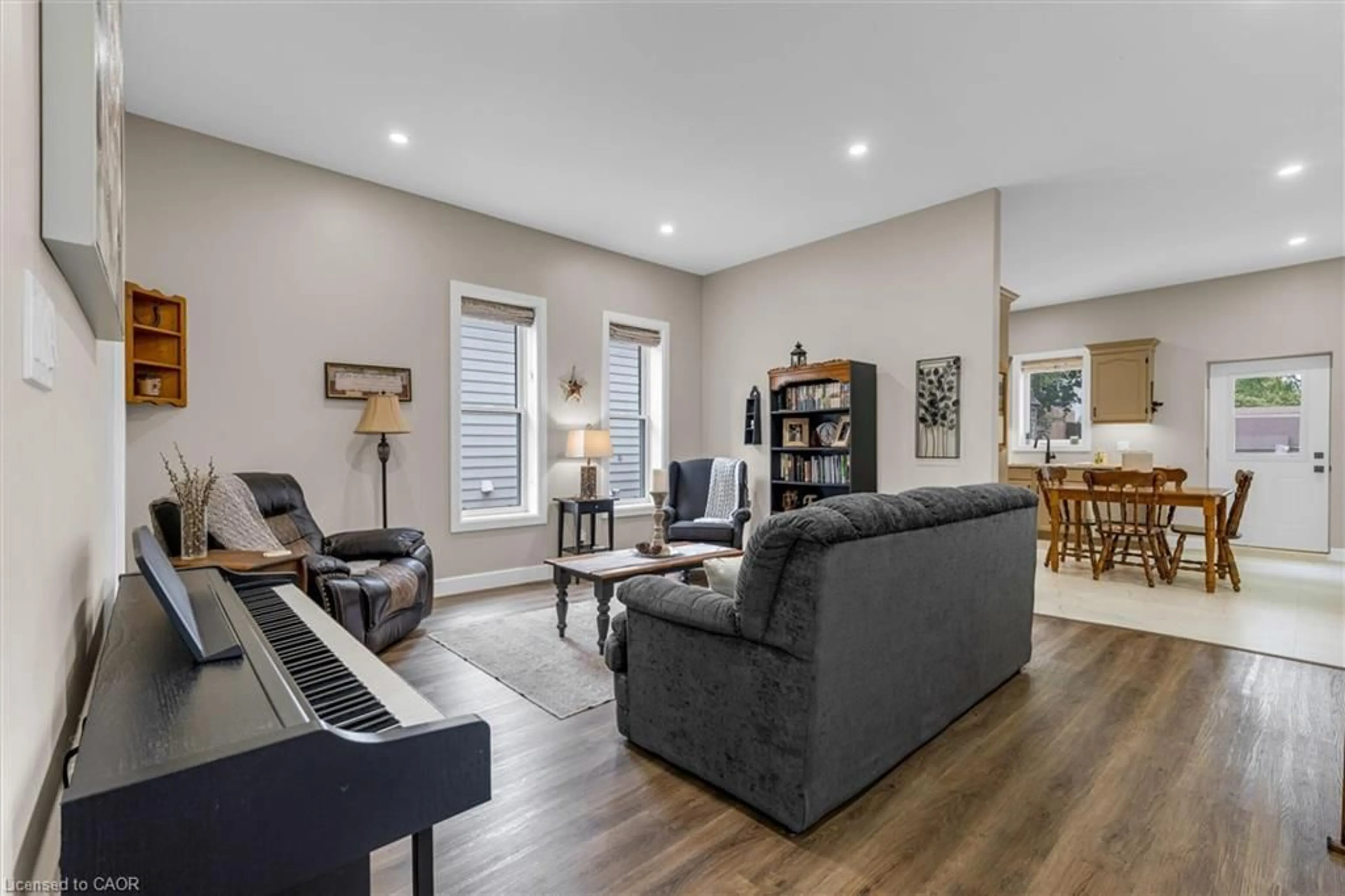 Living room with furniture, wood/laminate floor for 348 Dalhousie St, Brantford Ontario N3S 3W1