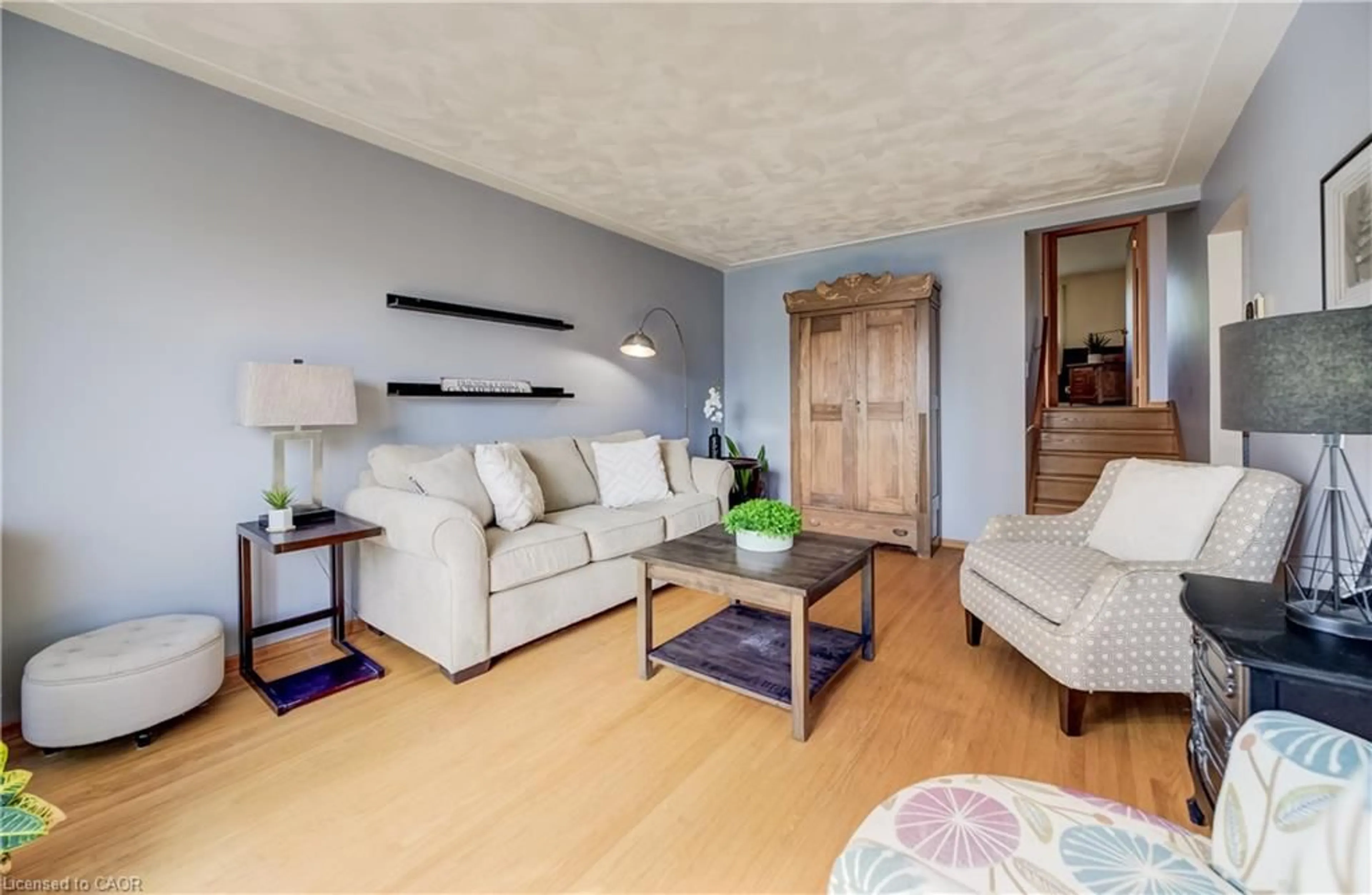 Living room with furniture, wood/laminate floor for 30 Kingswood Dr, Kitchener Ontario N2E 1A7