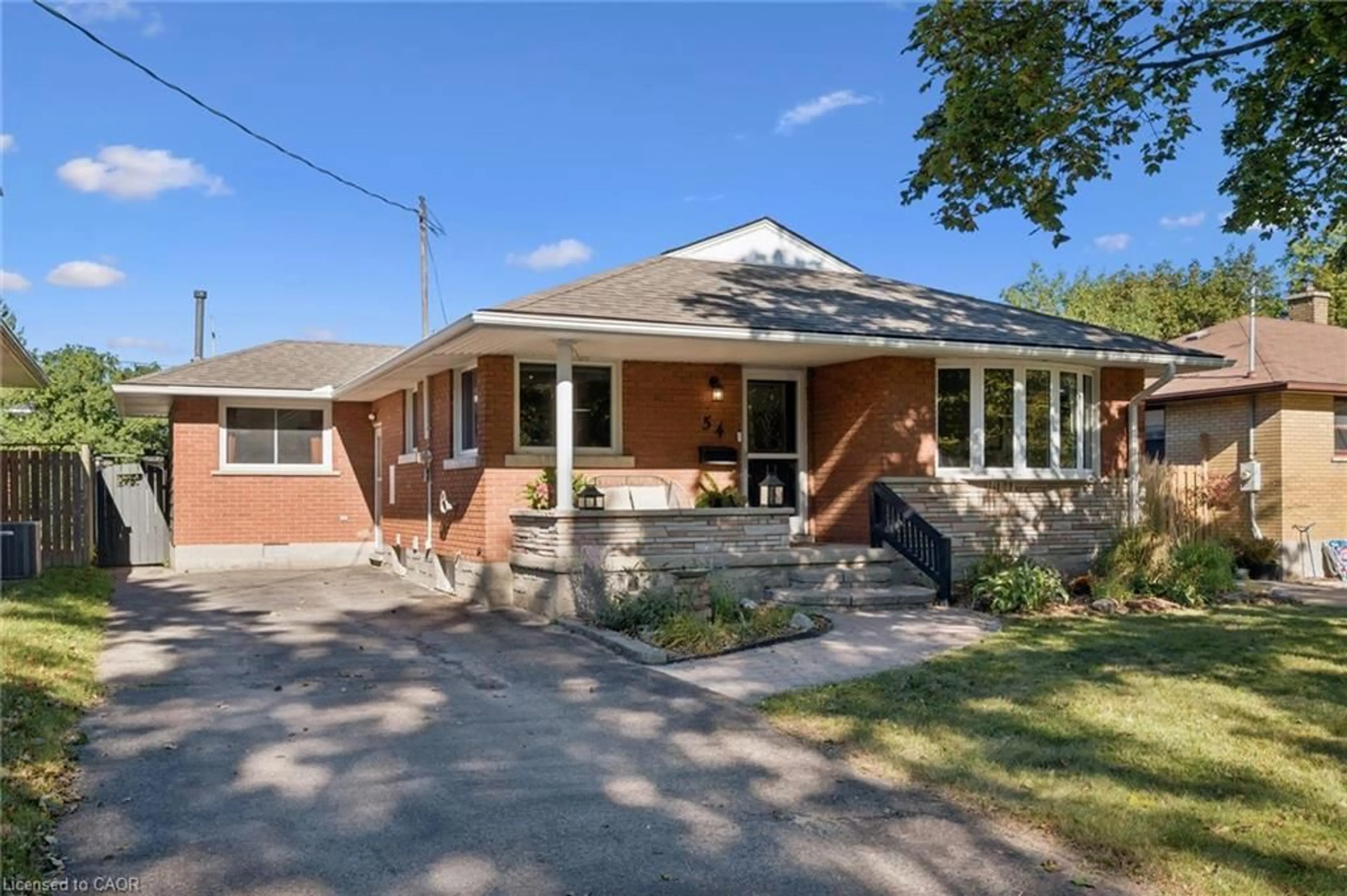 Home with brick exterior material, street for 54 Pinecrest Dr, Kitchener Ontario N2A 2G6
