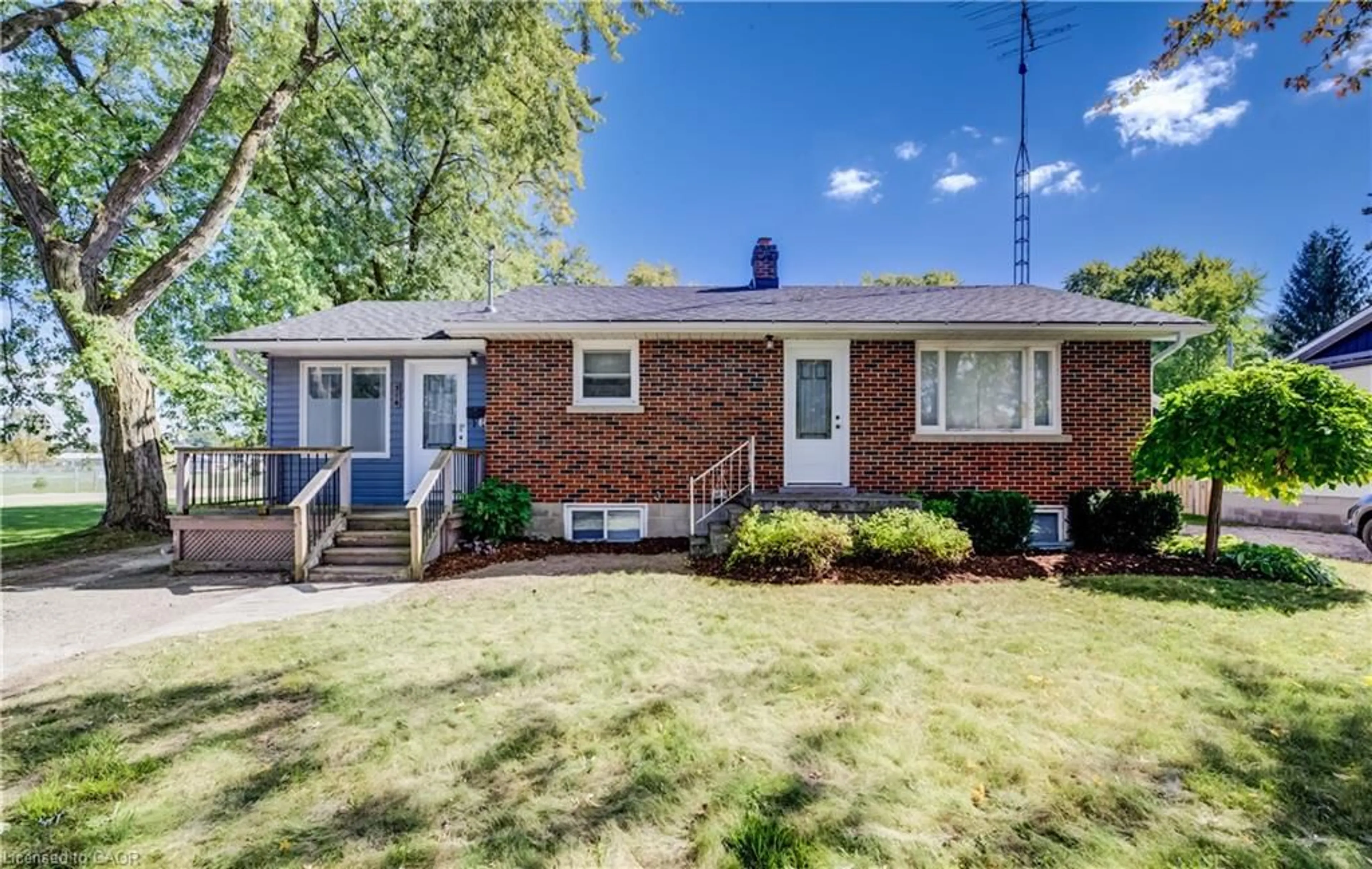 Home with brick exterior material, street for 314 Wellington St, Mount Forest Ontario N0G 2L2