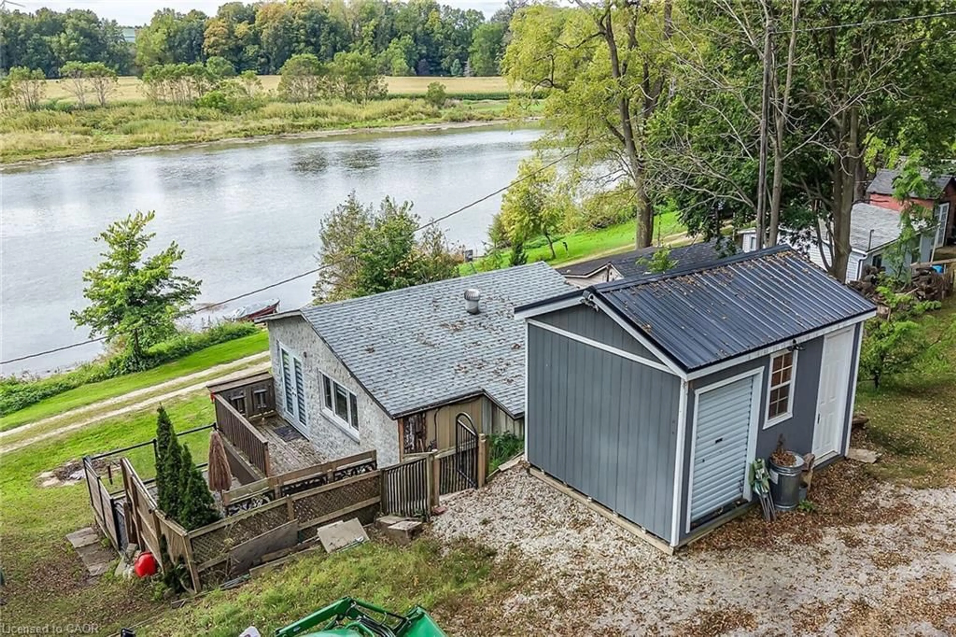 A pic from outside/outdoor area/front of a property/back of a property/a pic from drone, water/lake/river/ocean view for 7 Riverfront Lane, Cayuga Ontario N0A 1E0