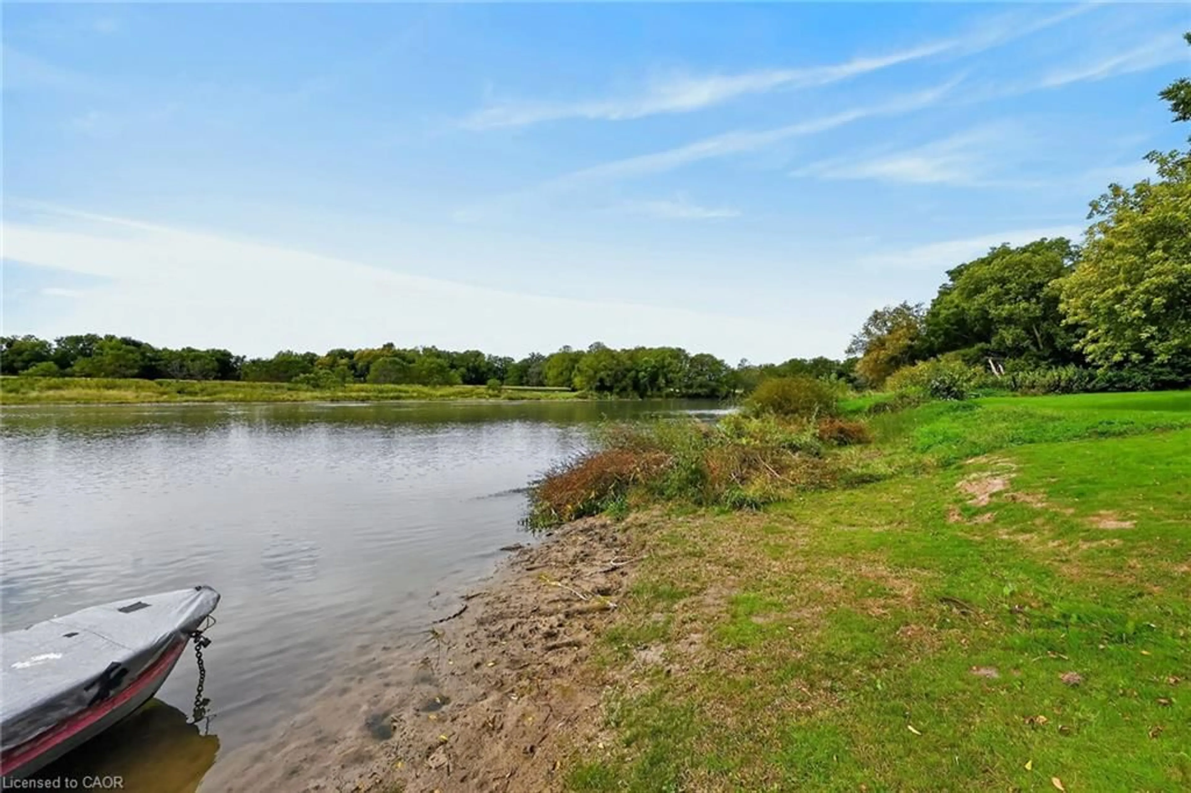 A pic from outside/outdoor area/front of a property/back of a property/a pic from drone, water/lake/river/ocean view for 7 Riverfront Lane, Cayuga Ontario N0A 1E0