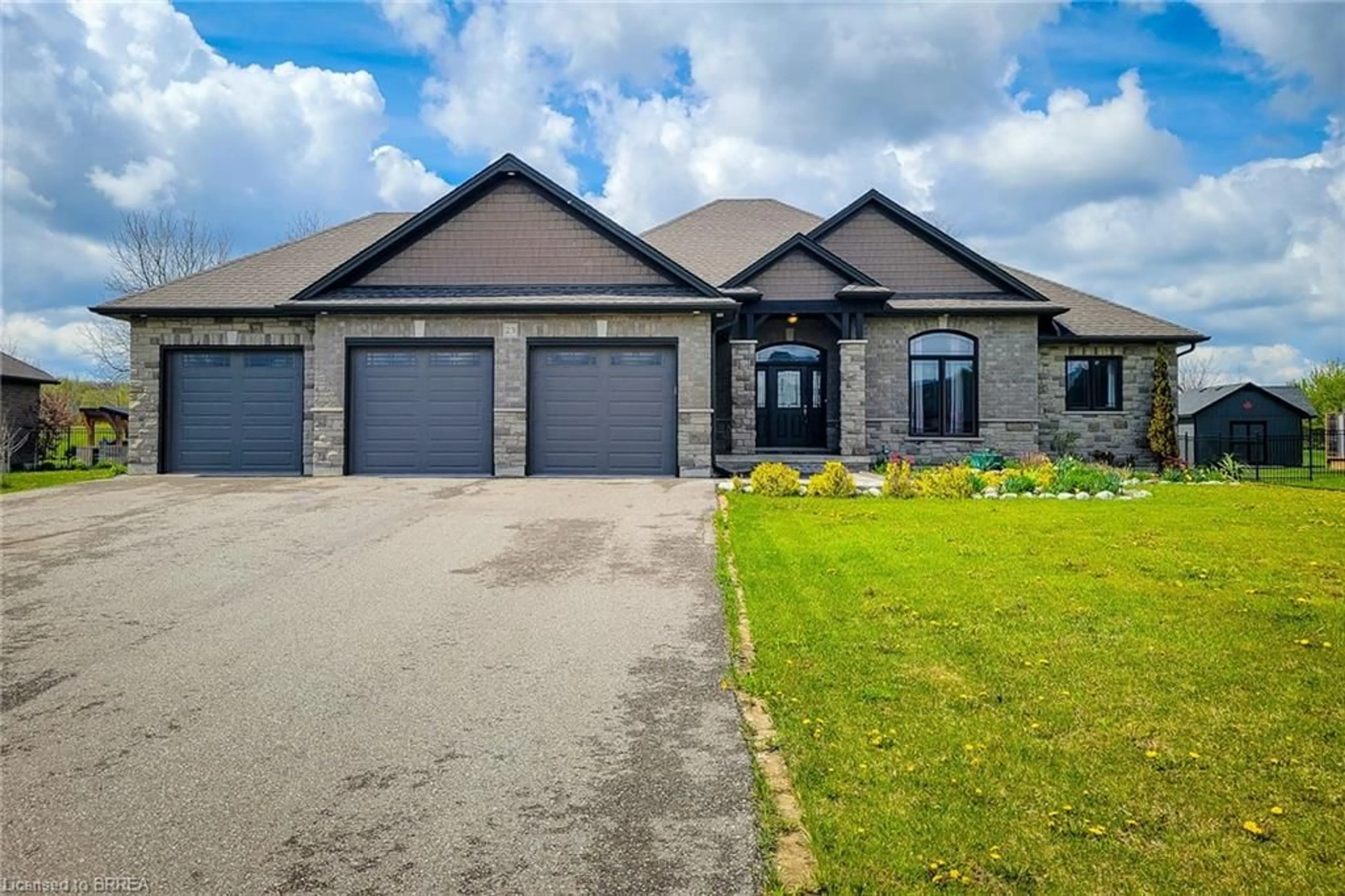 Home with brick exterior material, street for 23 Tedley Blvd, Brantford Ontario N3T 0E3