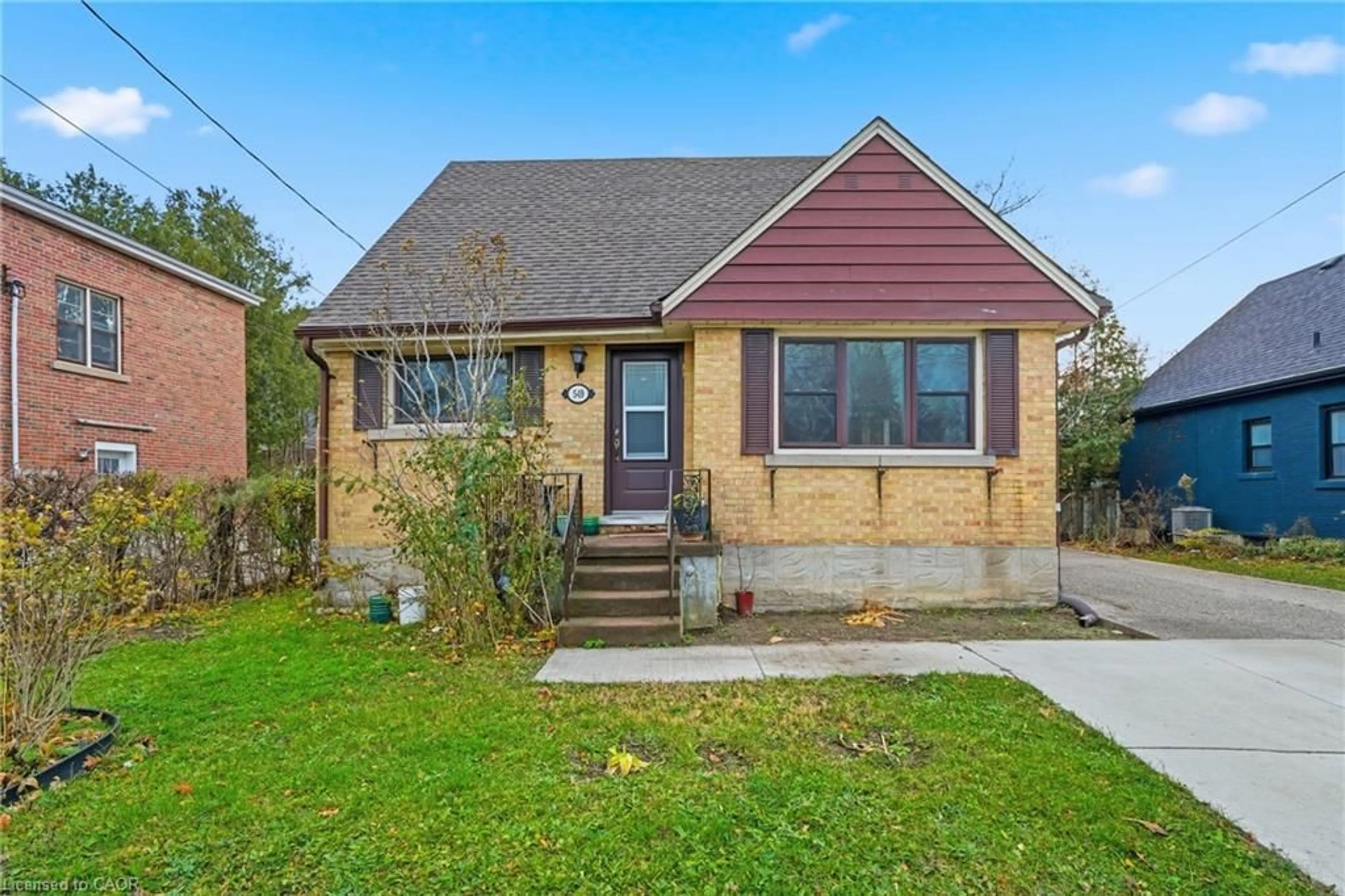 Home with brick exterior material, street for 549 Weber St, Kitchener Ontario N2H 1E9