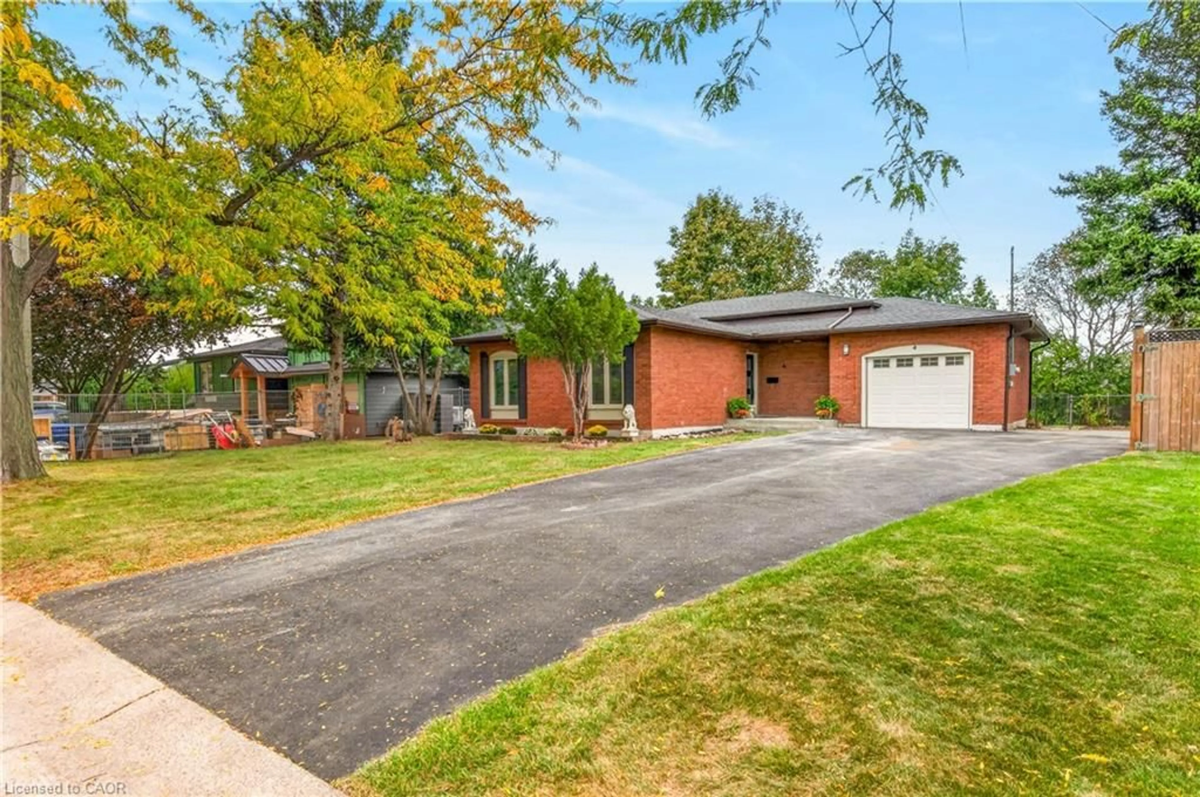 Home with brick exterior material, street for 4 Woodcrest Dr, Grimsby Ontario L3M 1C4