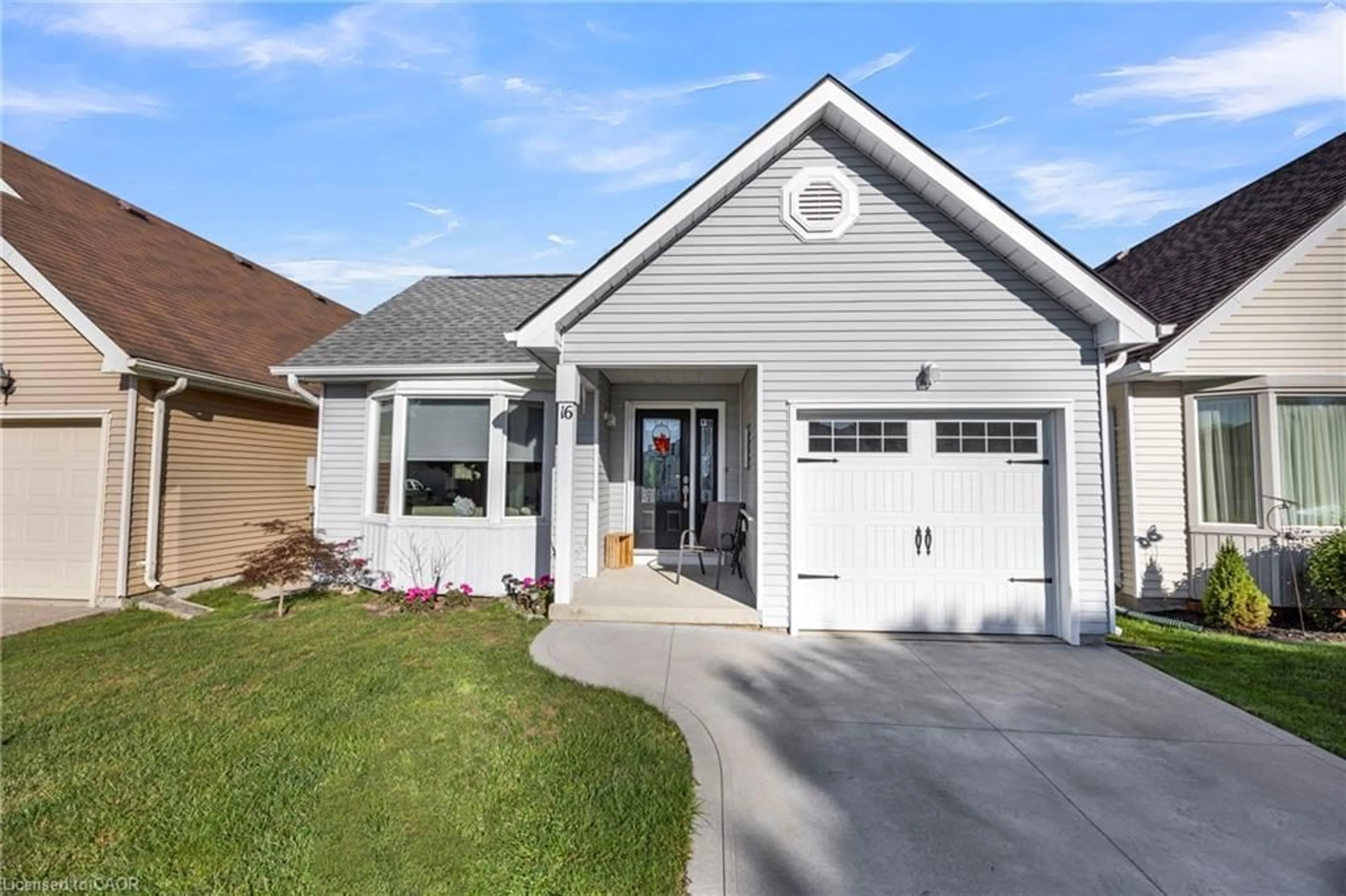 Home with vinyl exterior material, street for 16 Hawkins Cres, Tillsonburg Ontario N4G 5K7