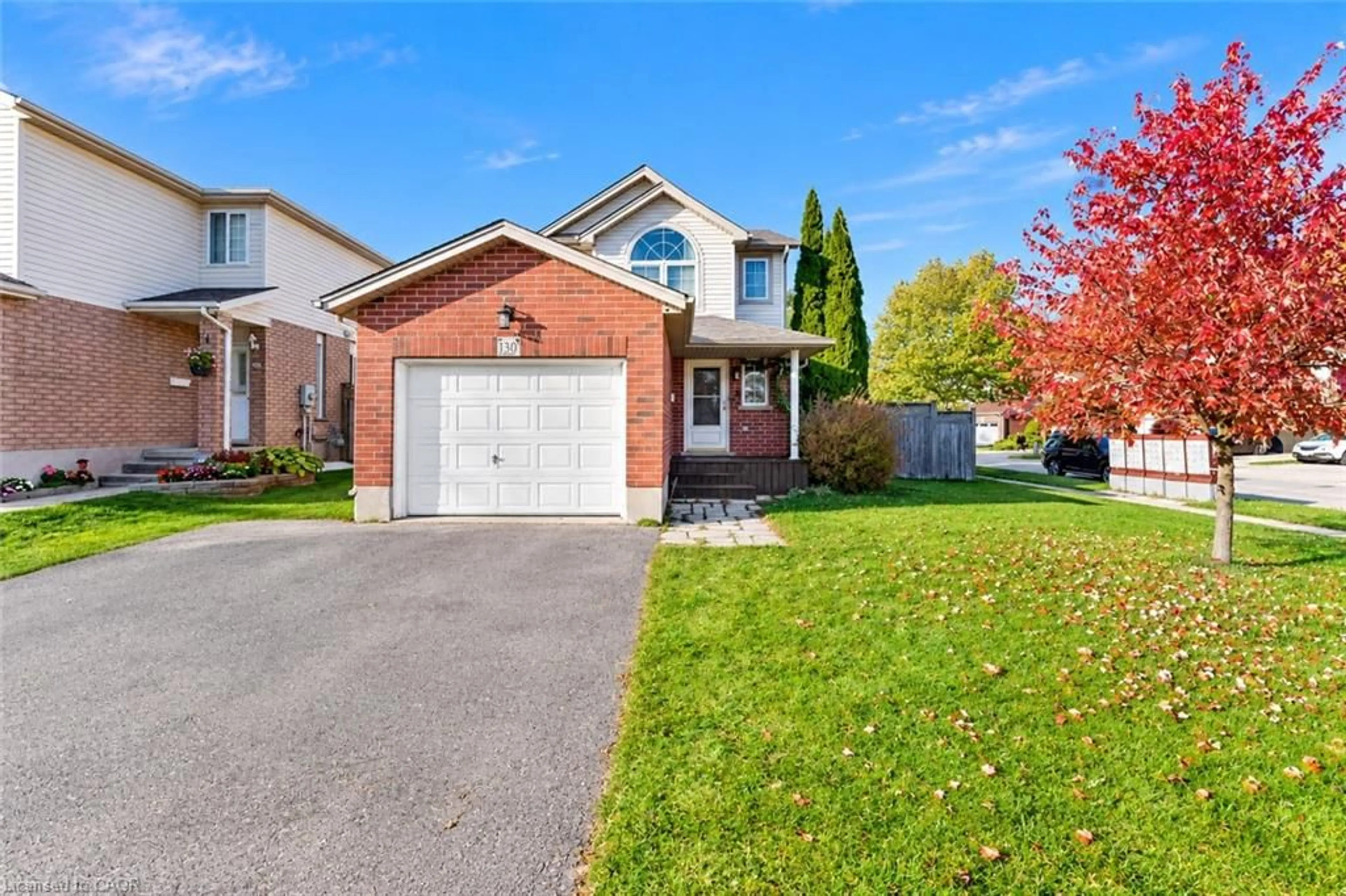 Home with brick exterior material, street for 130 Cotton Grass St, Kitchener Ontario N2E 3T5