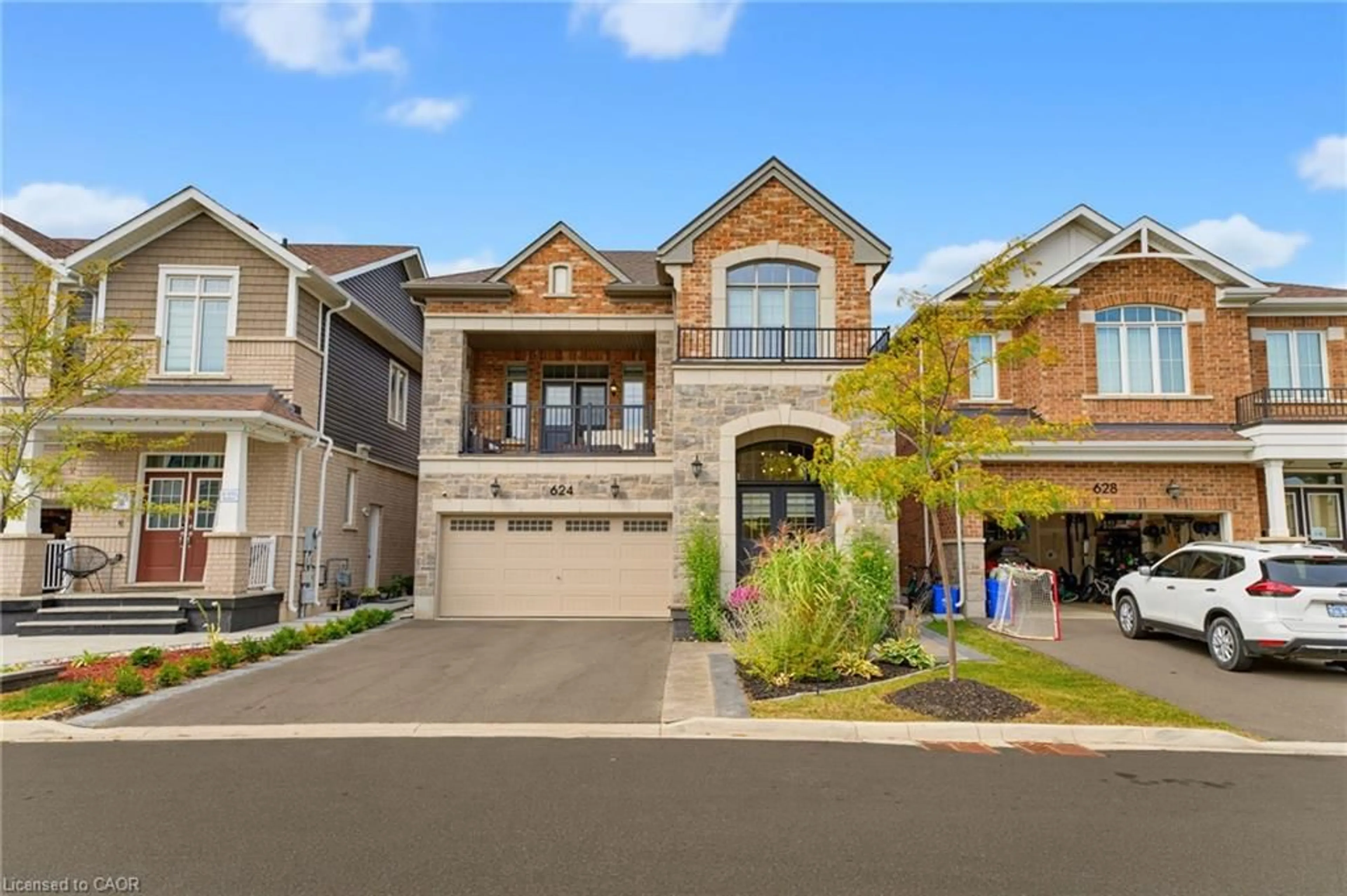 Home with brick exterior material, street for 624 Boyd Lane, Milton Ontario L9E 1W6