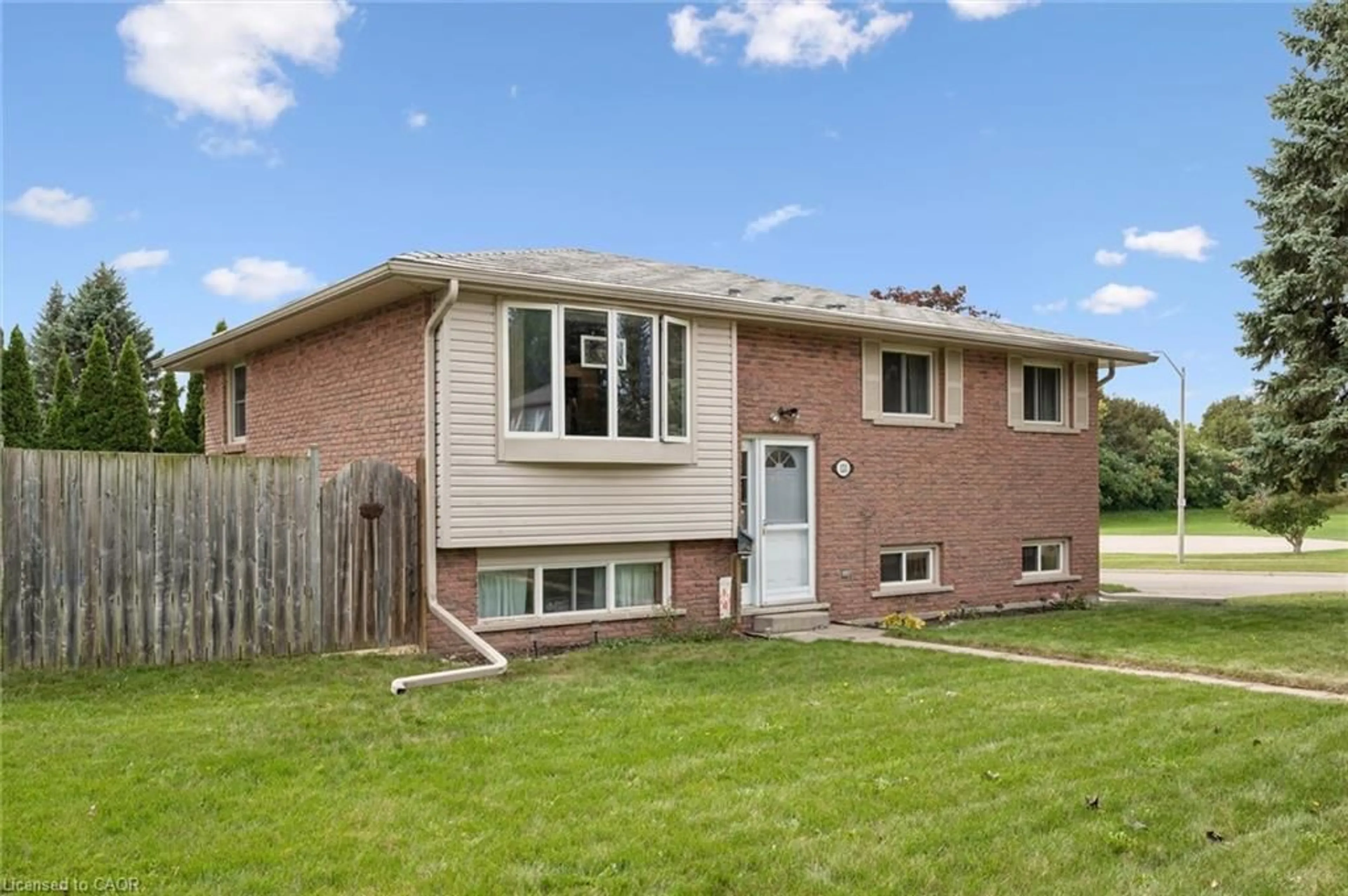Home with brick exterior material, street for 121 Nathaniel Cres, Kitchener Ontario N2P 1L3