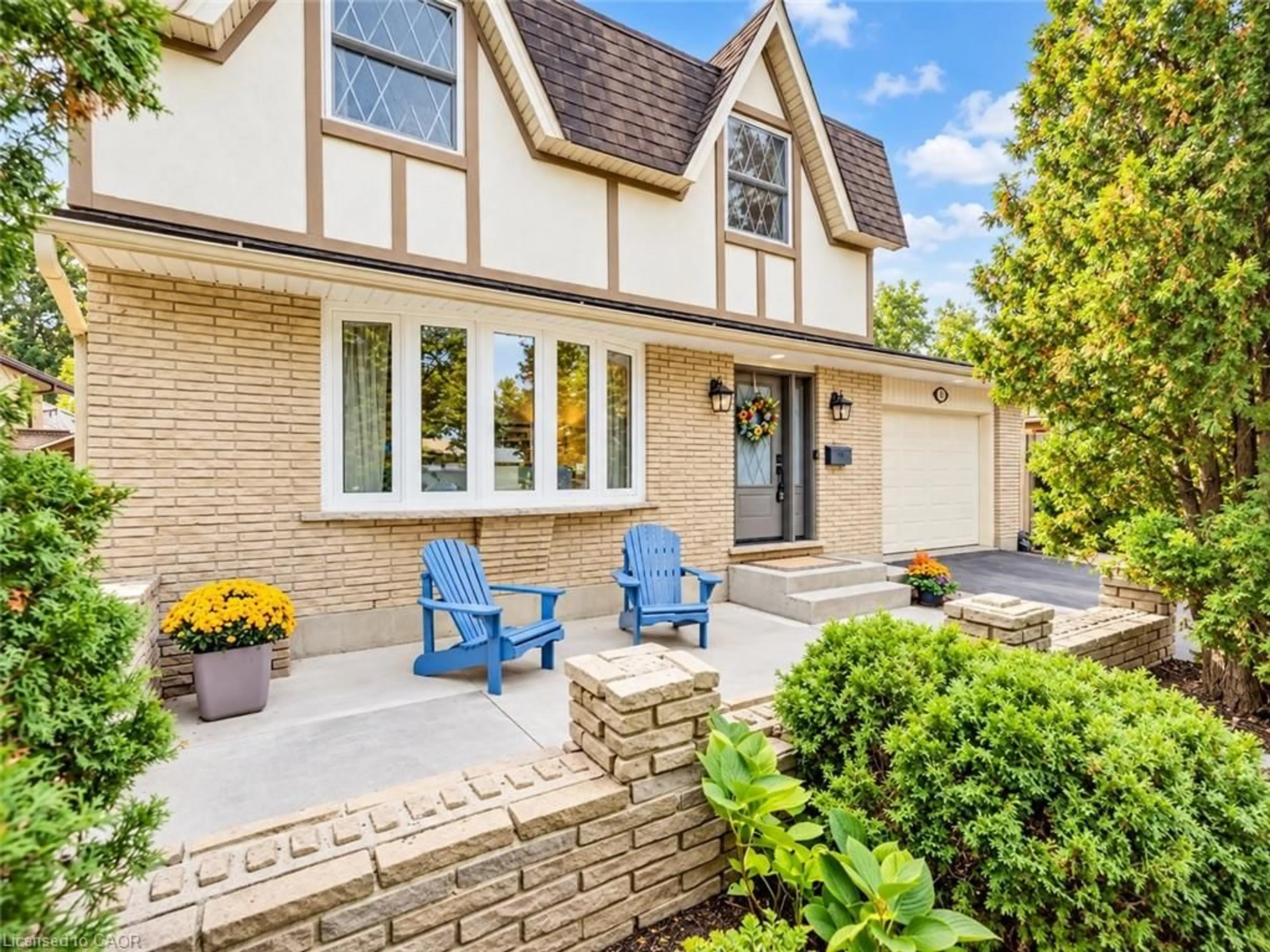 Home with brick exterior material, street for 97 Devonglen Dr, Kitchener Ontario N2R 1Z7