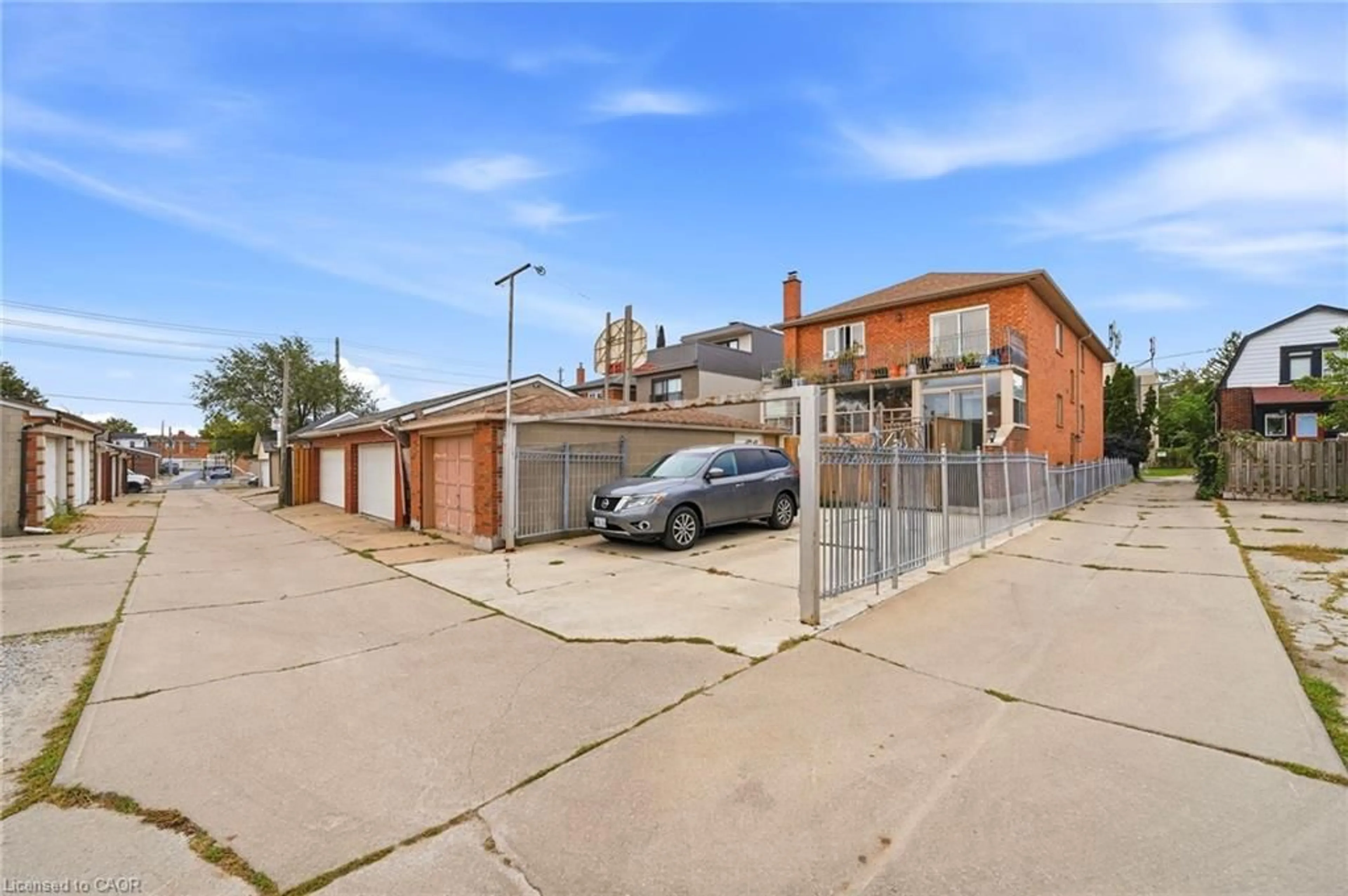 A pic from outside/outdoor area/front of a property/back of a property/a pic from drone, street for 277 Harvie Ave, York Ontario M6E 4L1