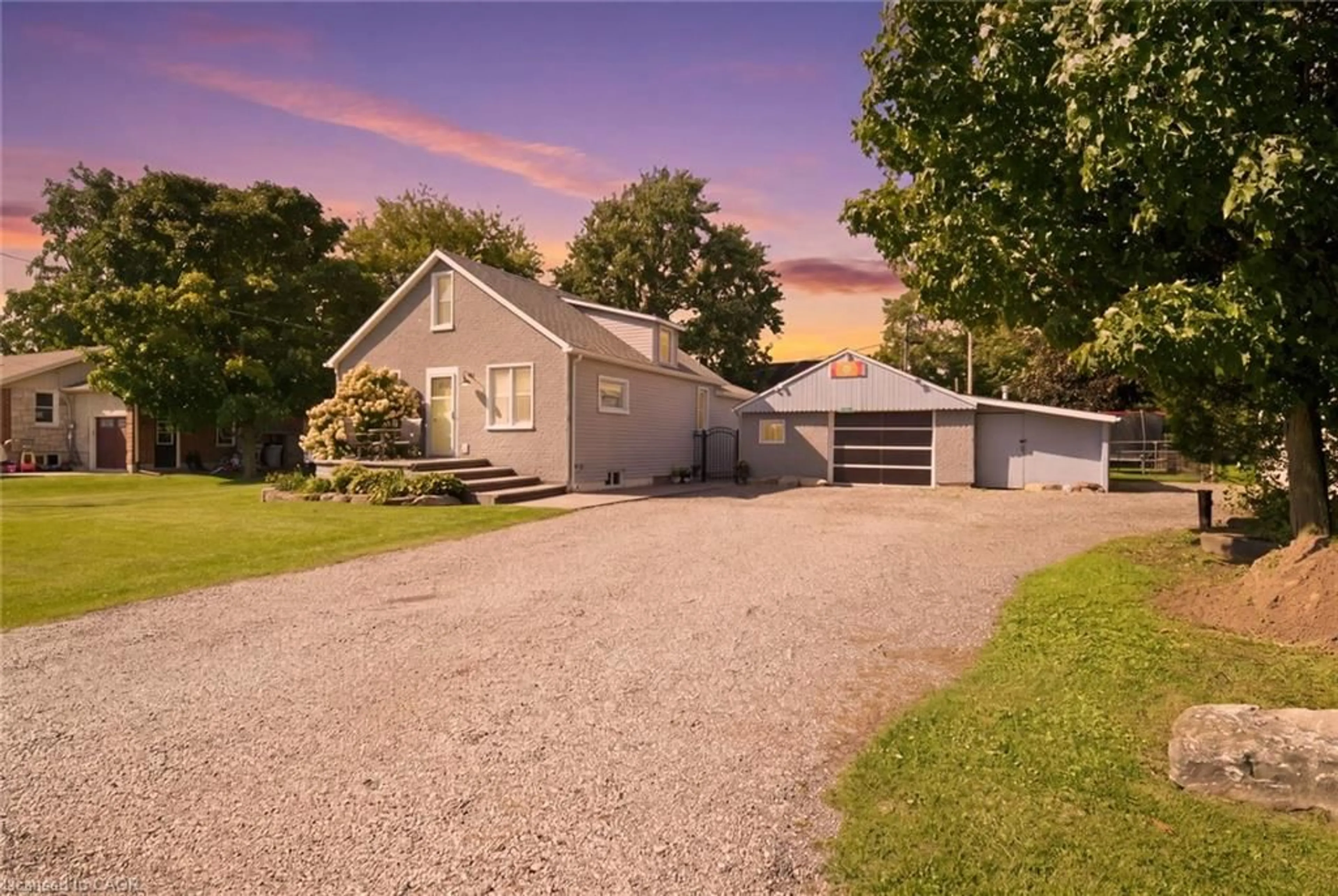A pic from outside/outdoor area/front of a property/back of a property/a pic from drone, street for 2214 William Shakespeare St, Shakespeare Ontario N0B 2P0
