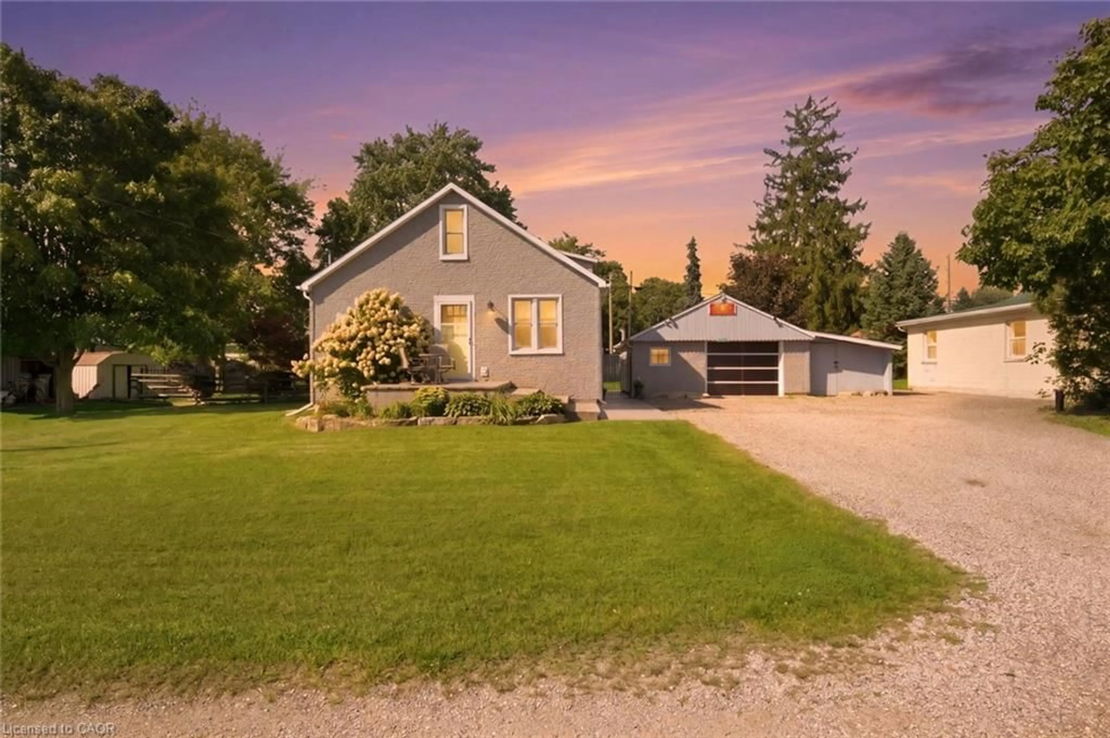 A pic from outside/outdoor area/front of a property/back of a property/a pic from drone, street for 2214 William Shakespeare St, Shakespeare Ontario N0B 2P0