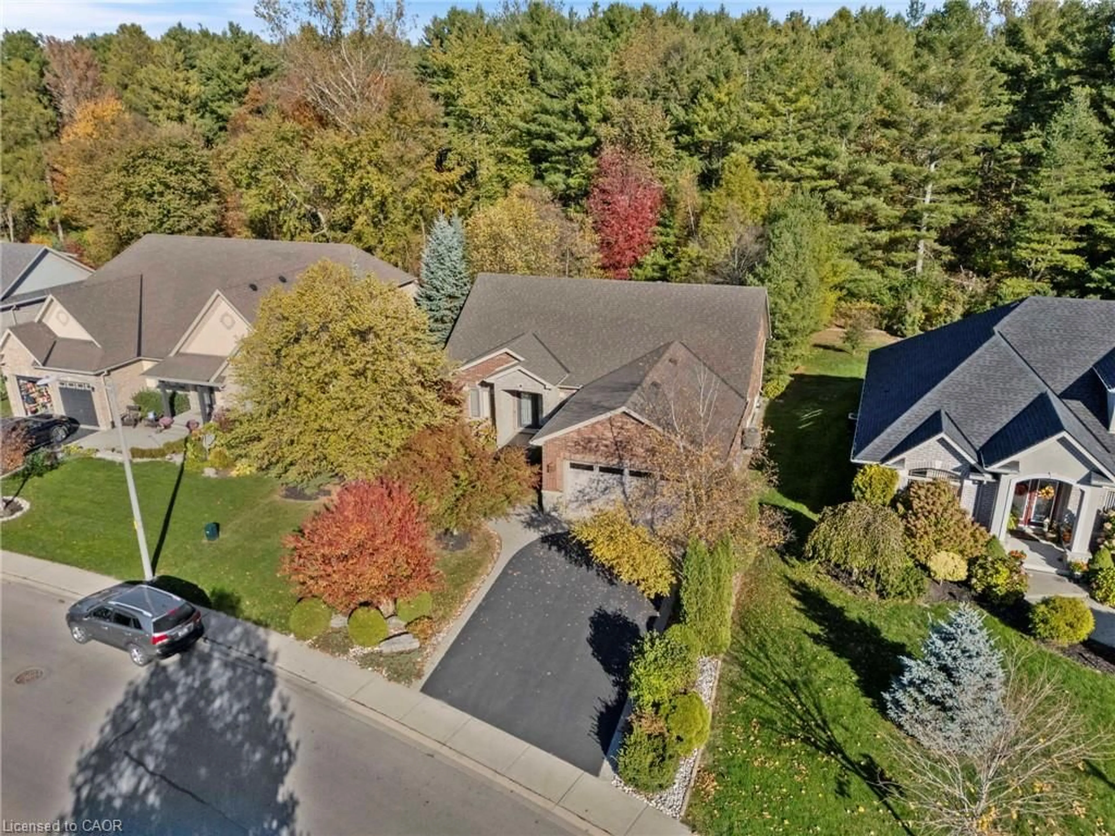 A pic from outside/outdoor area/front of a property/back of a property/a pic from drone, street for 64 Newport Lane, Port Dover Ontario N0A 1N7