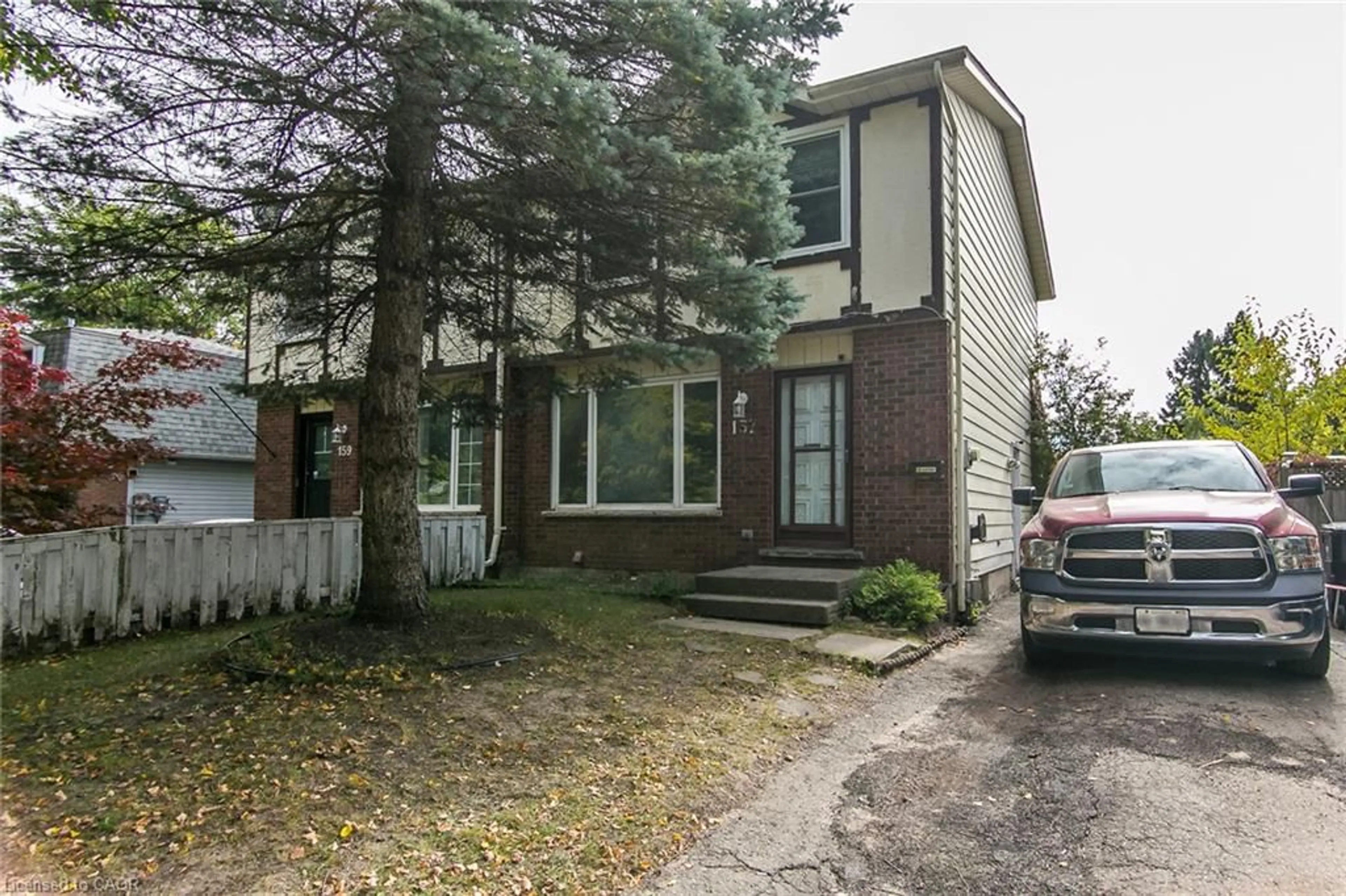 Home with brick exterior material, street for 157 Old Carriage Dr, Kitchener Ontario N2P 1H5