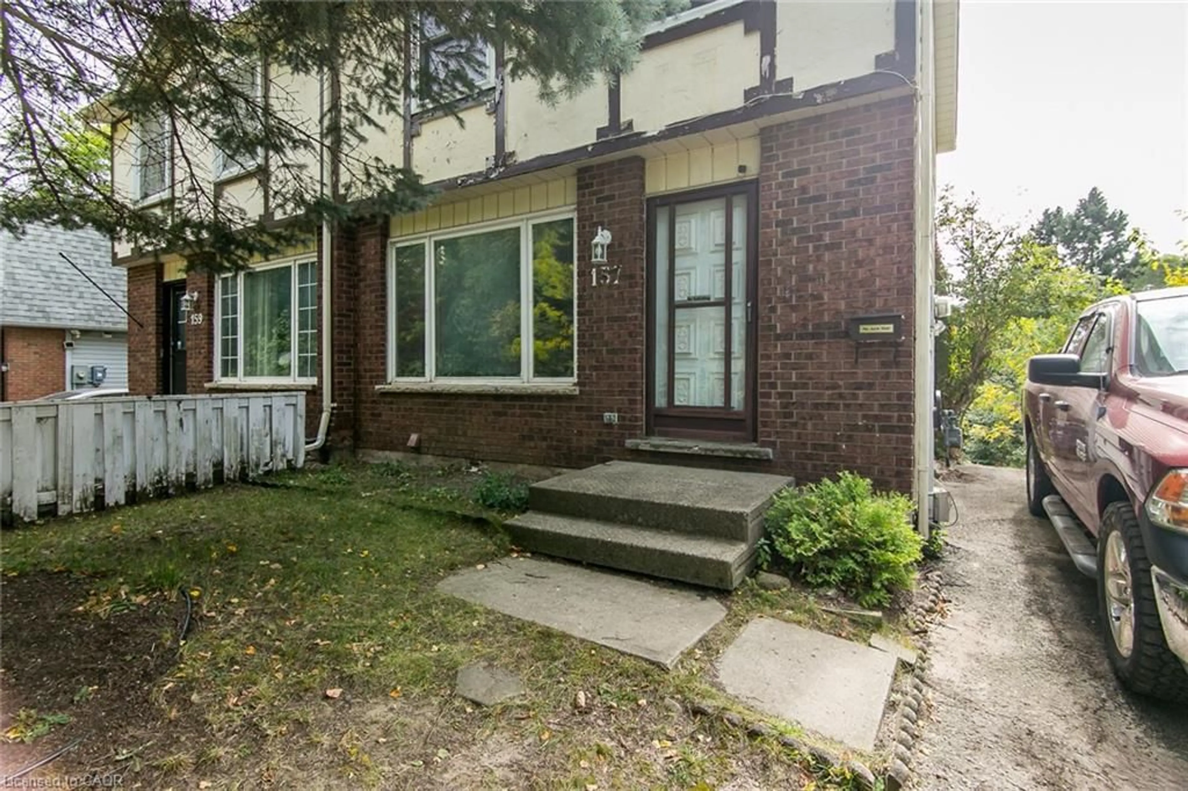 Home with brick exterior material, street for 157 Old Carriage Dr, Kitchener Ontario N2P 1H5