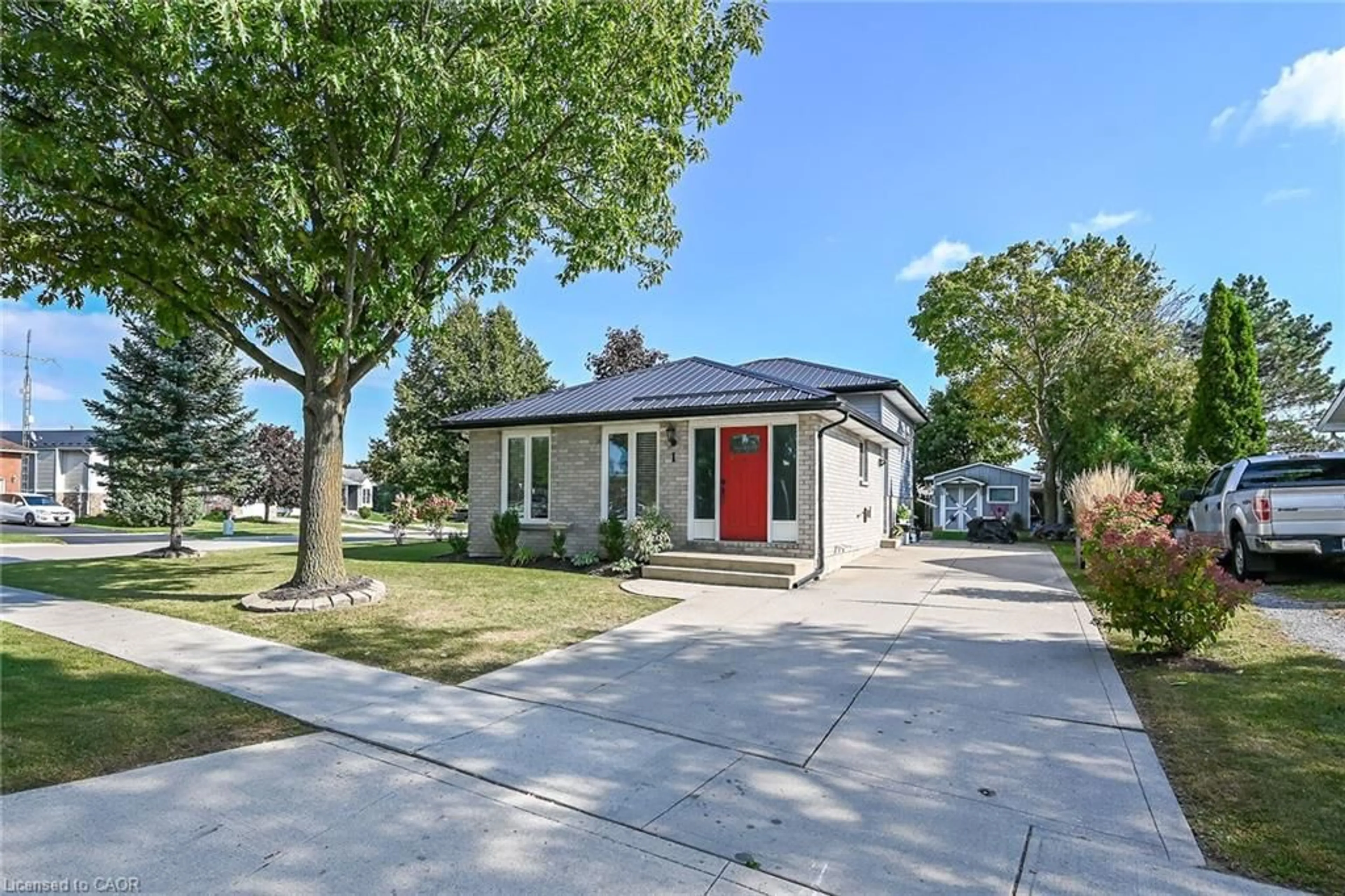 Home with vinyl exterior material, street for 1 Woodfield Ave, Townsend Ontario N0A 1S0