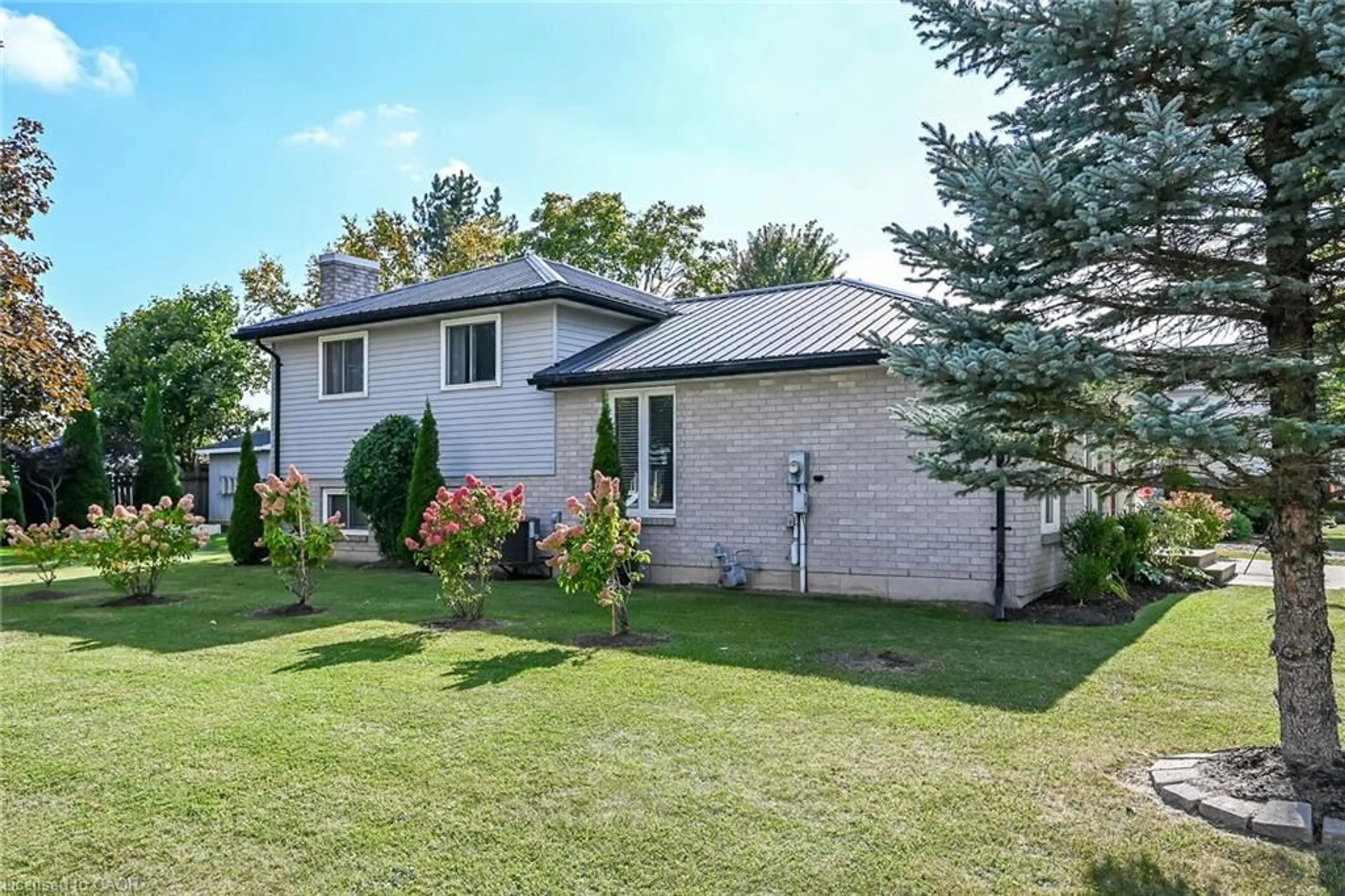 A pic from outside/outdoor area/front of a property/back of a property/a pic from drone, street for 1 Woodfield Ave, Townsend Ontario N0A 1S0
