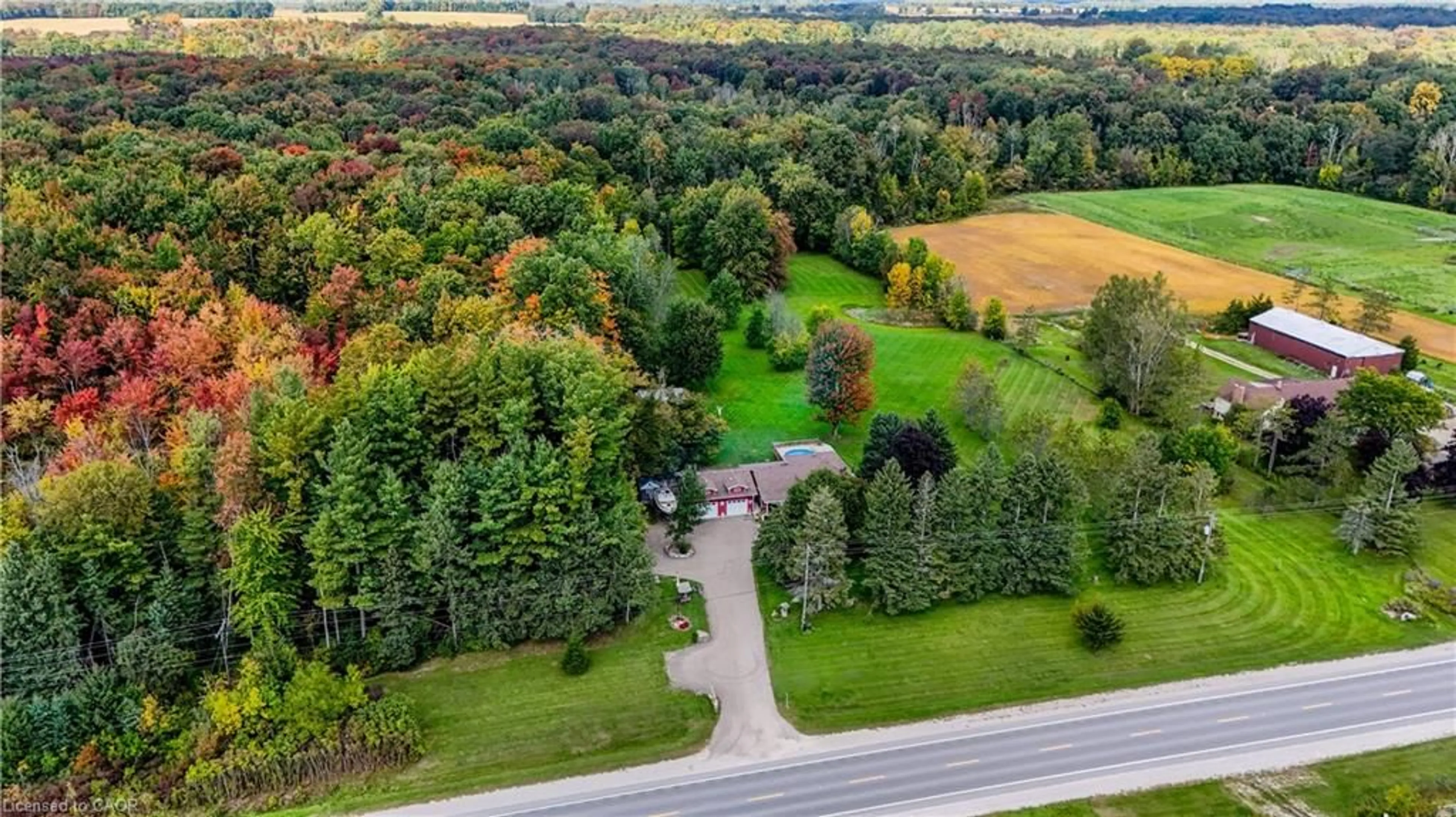 A pic from outside/outdoor area/front of a property/back of a property/a pic from drone, forest/trees view for 685999 Kings Highway 2 Hwy, Oxford County Ontario N4S 7V9