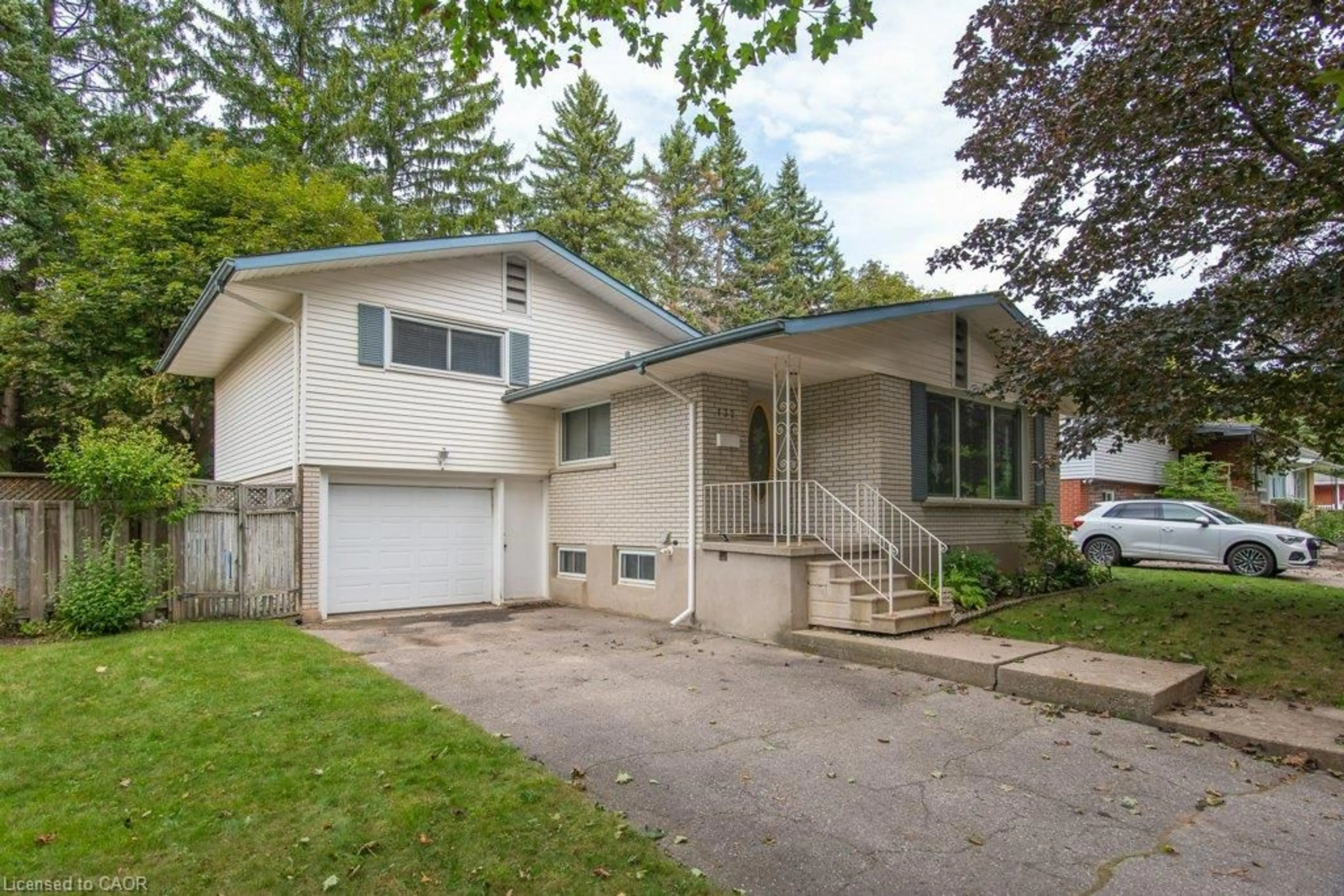 Home with vinyl exterior material, street for 132 Forest Hill Dr, Kitchener Ontario N2M 4G3