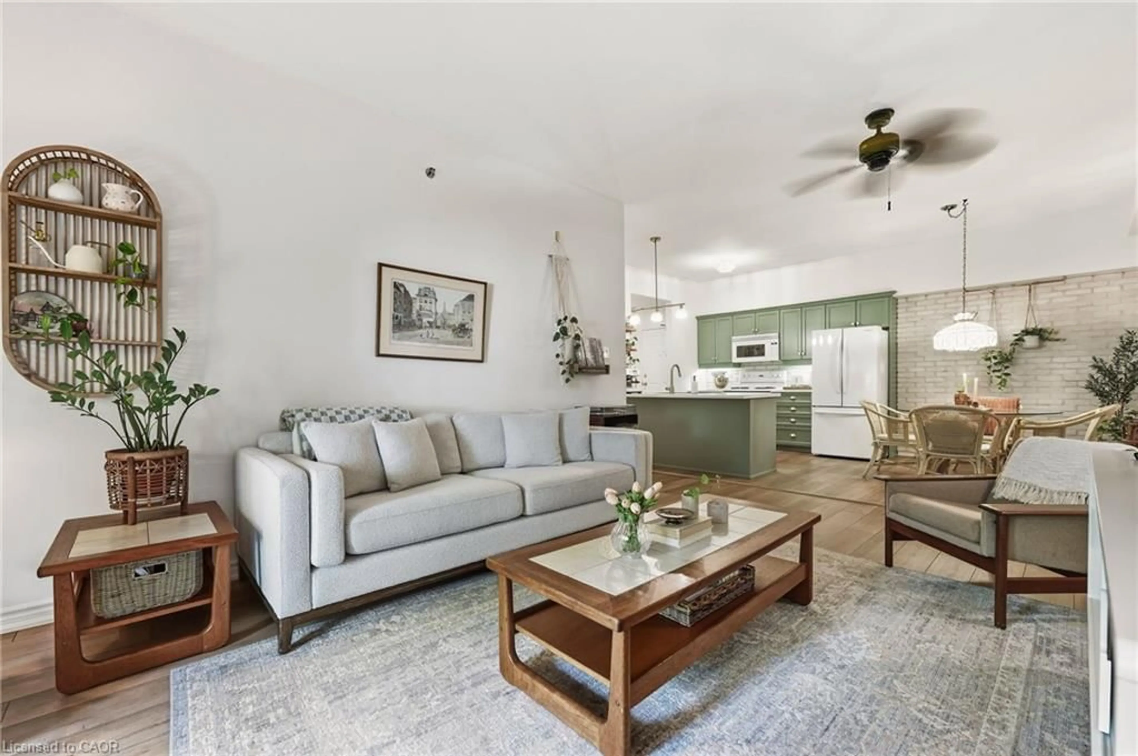 Living room with furniture, unknown for 391 Plains Rd #211, Burlington Ontario L7T 4M2