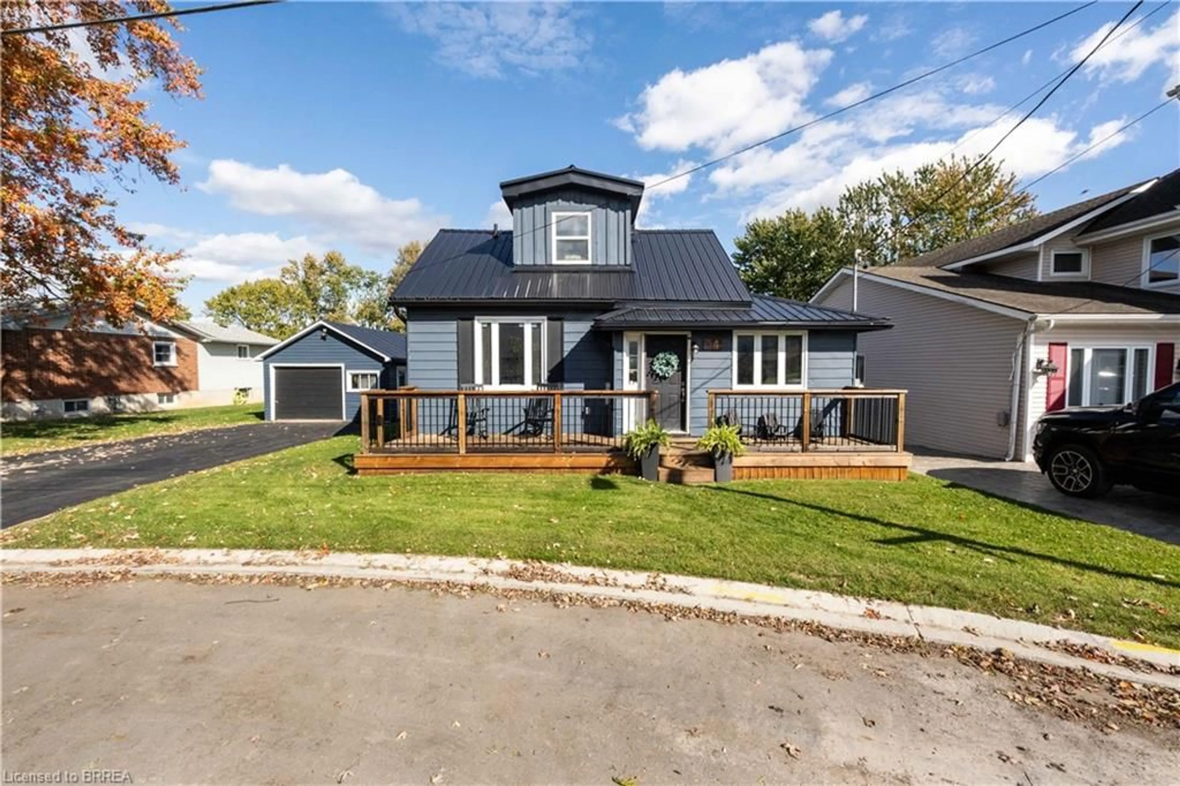 Home with vinyl exterior material, street for 54 Railway St, Princeton Ontario N0J 1V0