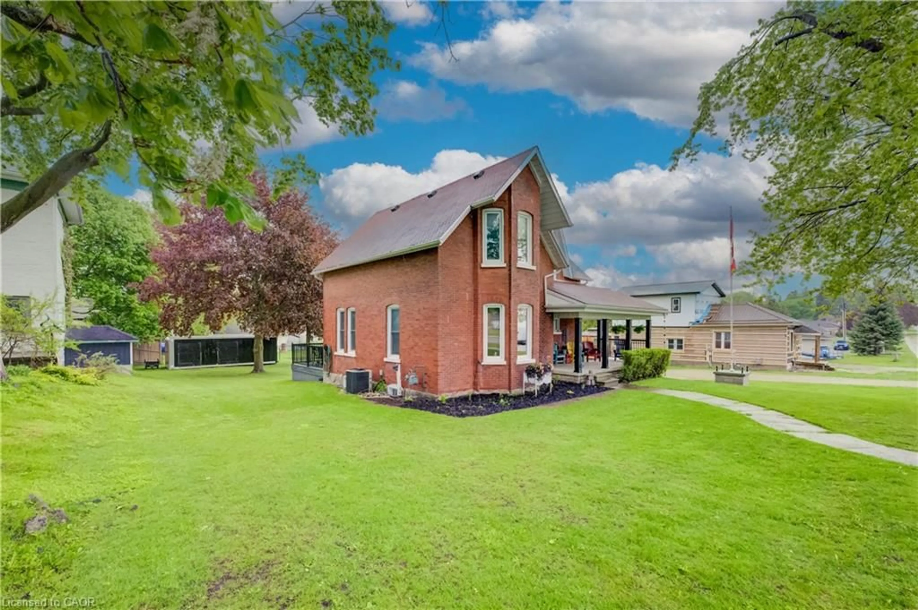 A pic from outside/outdoor area/front of a property/back of a property/a pic from drone, building for 310 Main St, Palmerston Ontario N0G 2P0