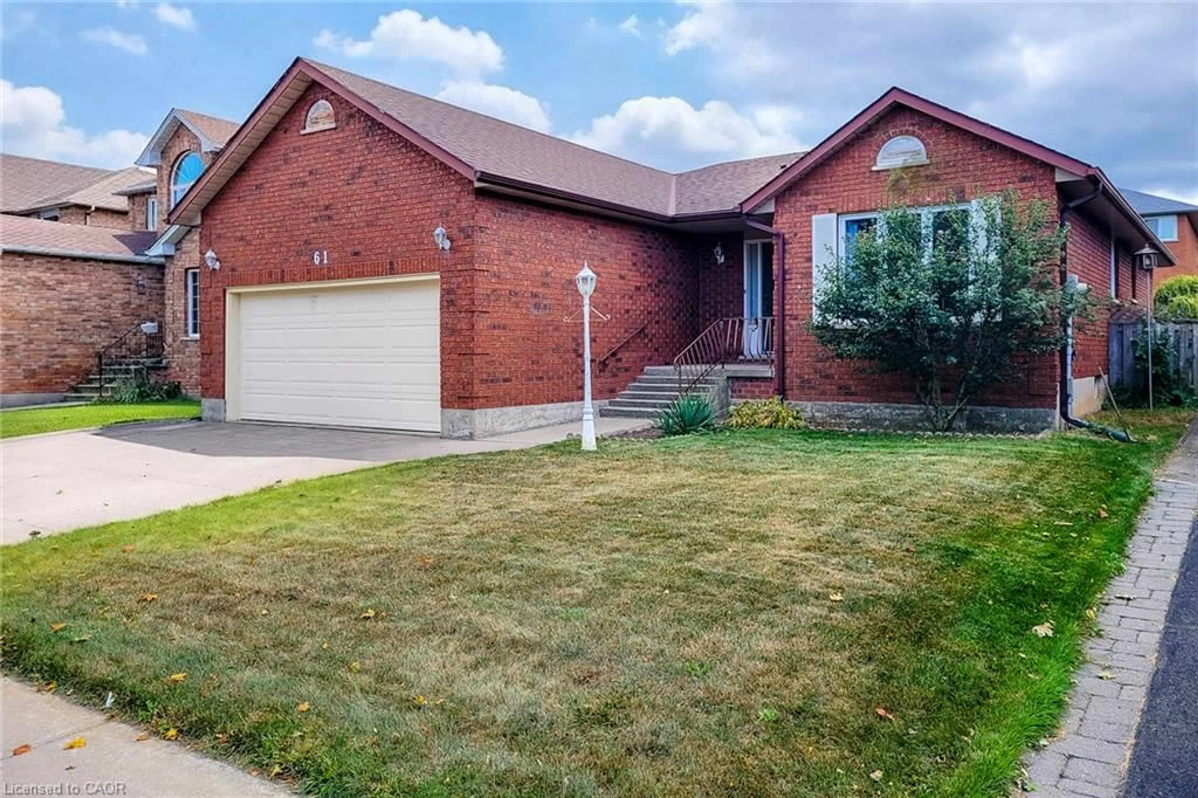 Home with brick exterior material, street for 61 Highland Rd, Stoney Creek Ontario L8J 2T7