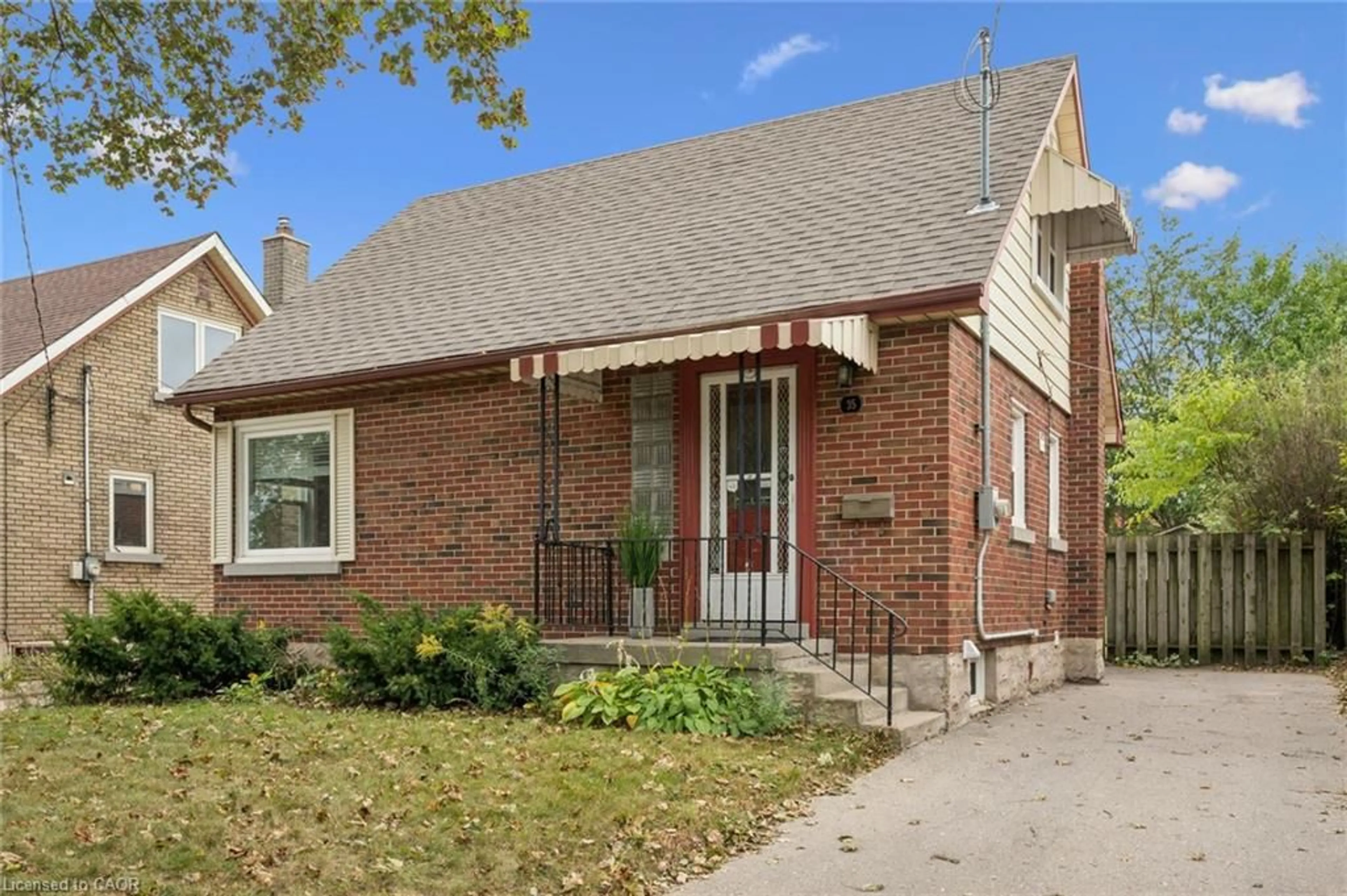 Home with brick exterior material, street for 35 Acacia St, Kitchener Ontario N2G 3B1