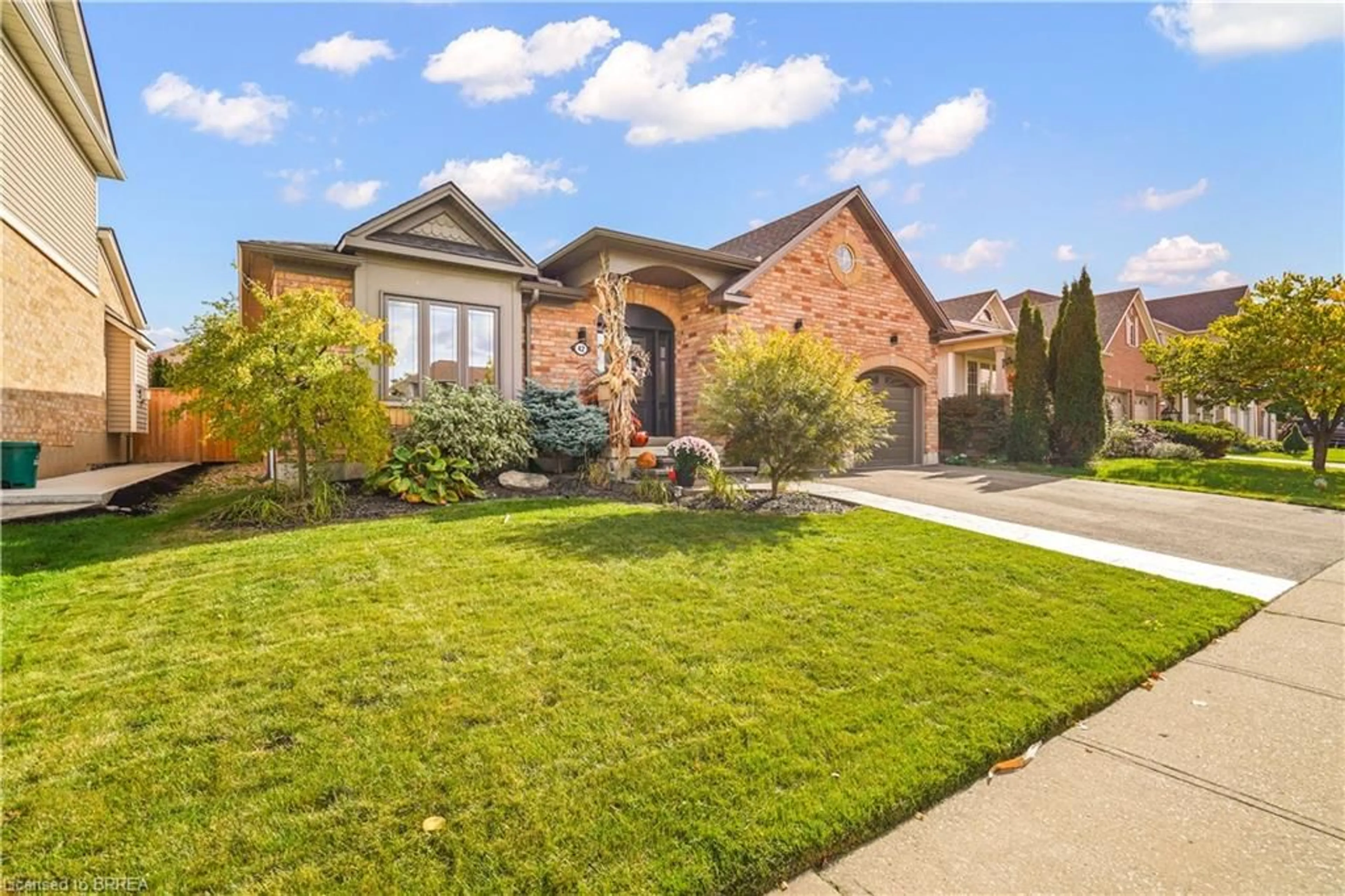 Home with brick exterior material, street for 42 Edith Monture Ave, Brantford Ontario N3T 6M8