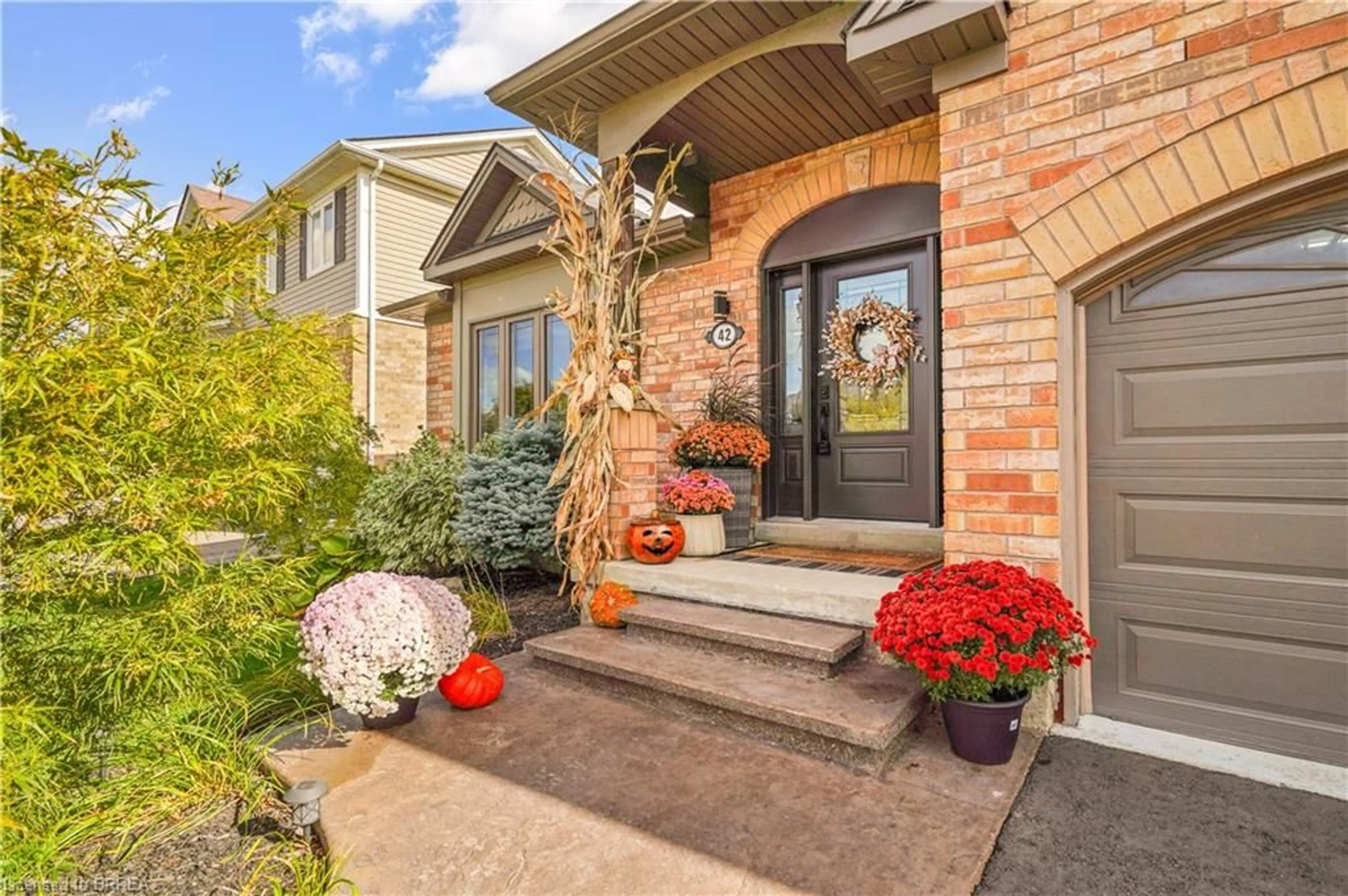 Home with brick exterior material, street for 42 Edith Monture Ave, Brantford Ontario N3T 6M8