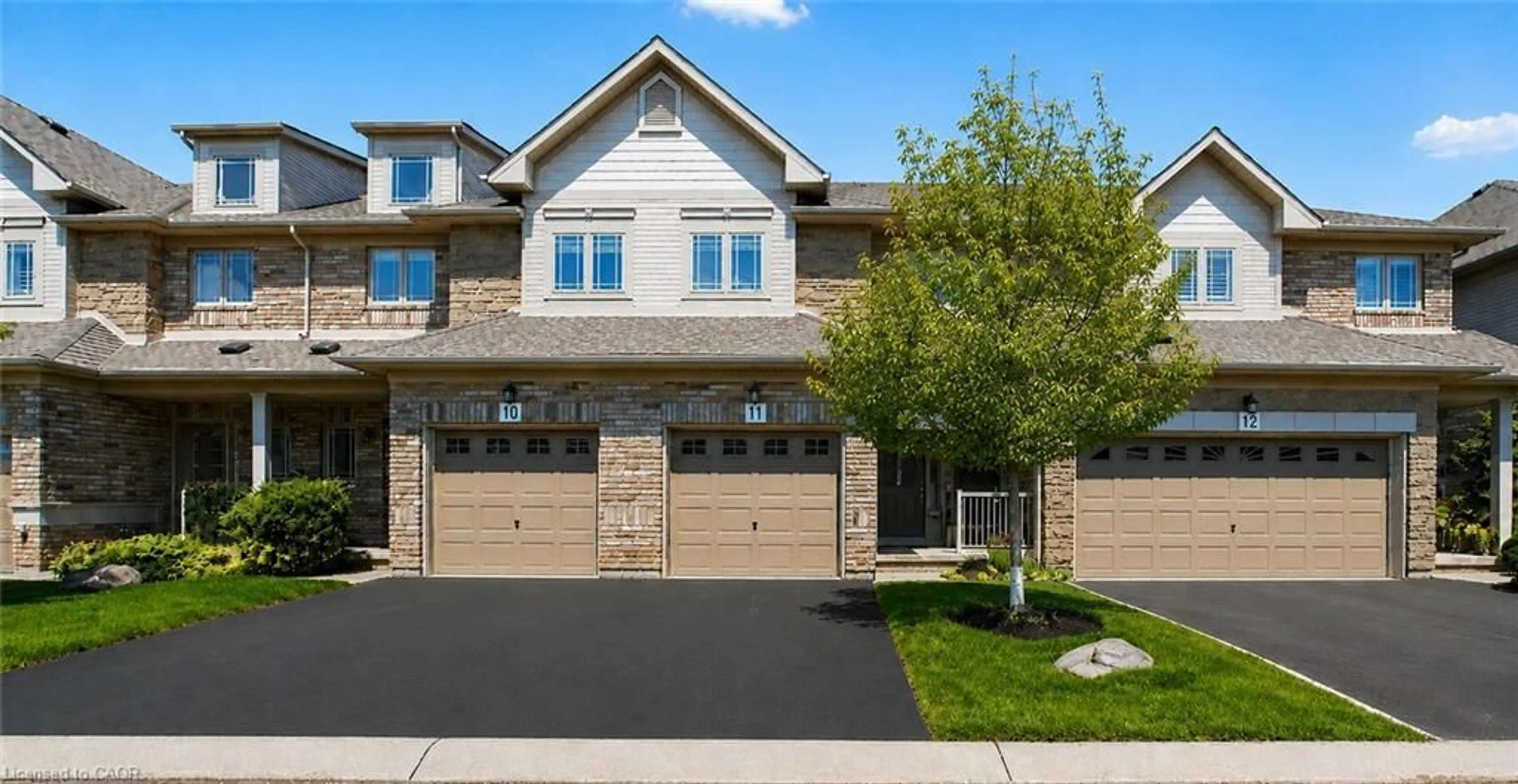Home with brick exterior material, street for 2169 Orchard Rd #11, Burlington Ontario L7L 7H9