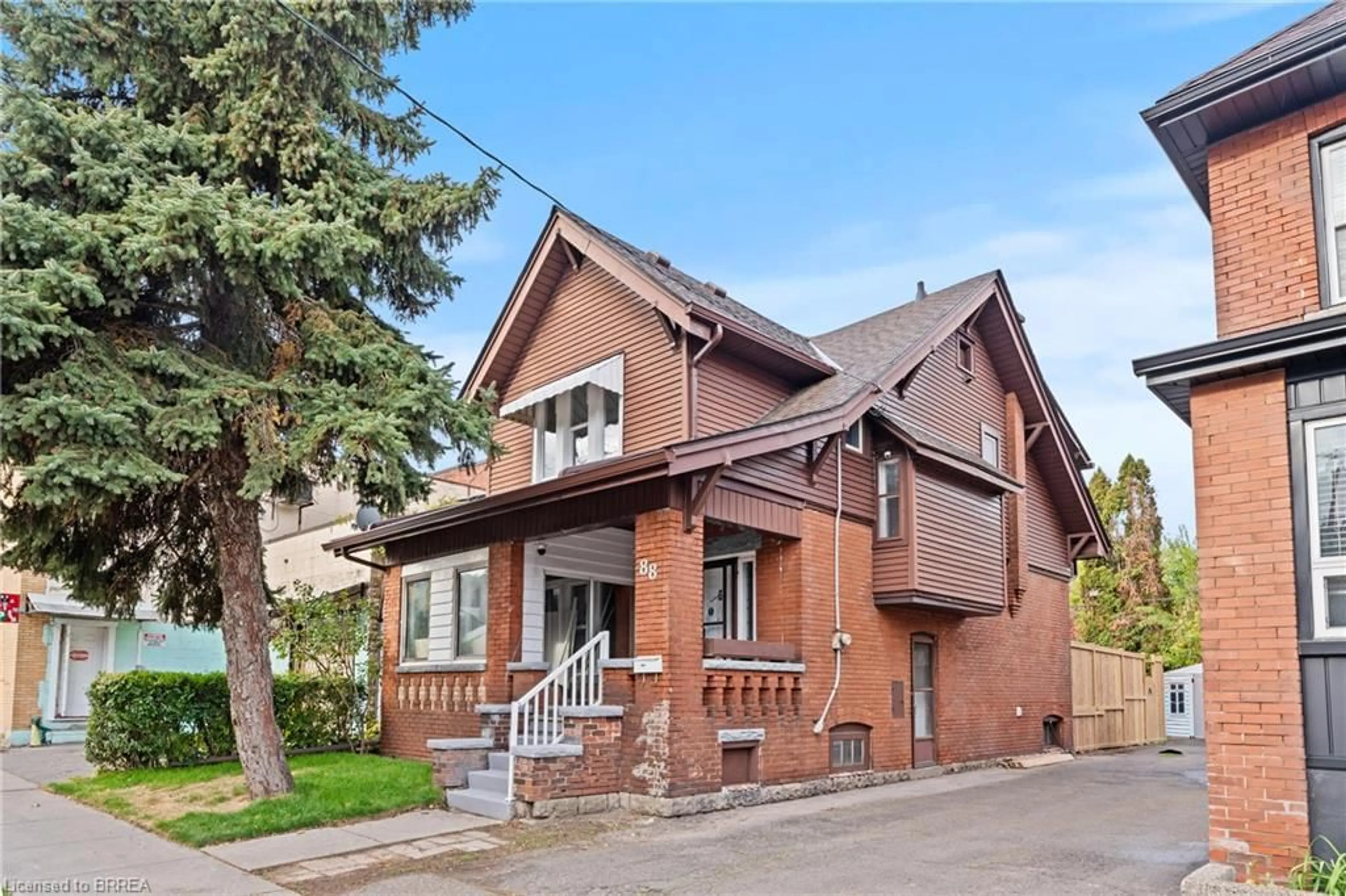 Home with brick exterior material, street for 88 Gage Ave, Hamilton Ontario L8M 3C9