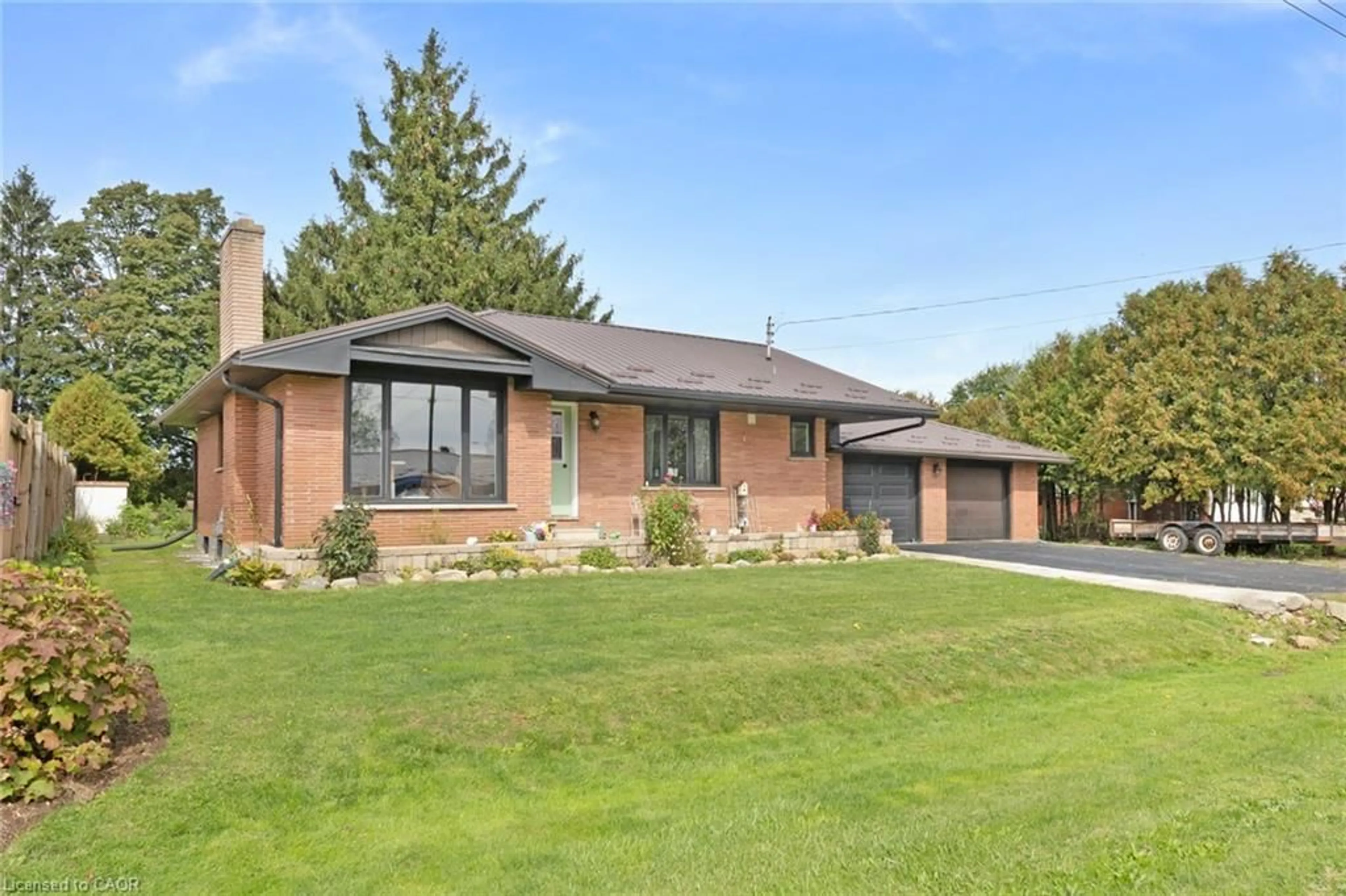 Home with brick exterior material, street for 24 Alpha St, Delhi Ontario N4B 1B2