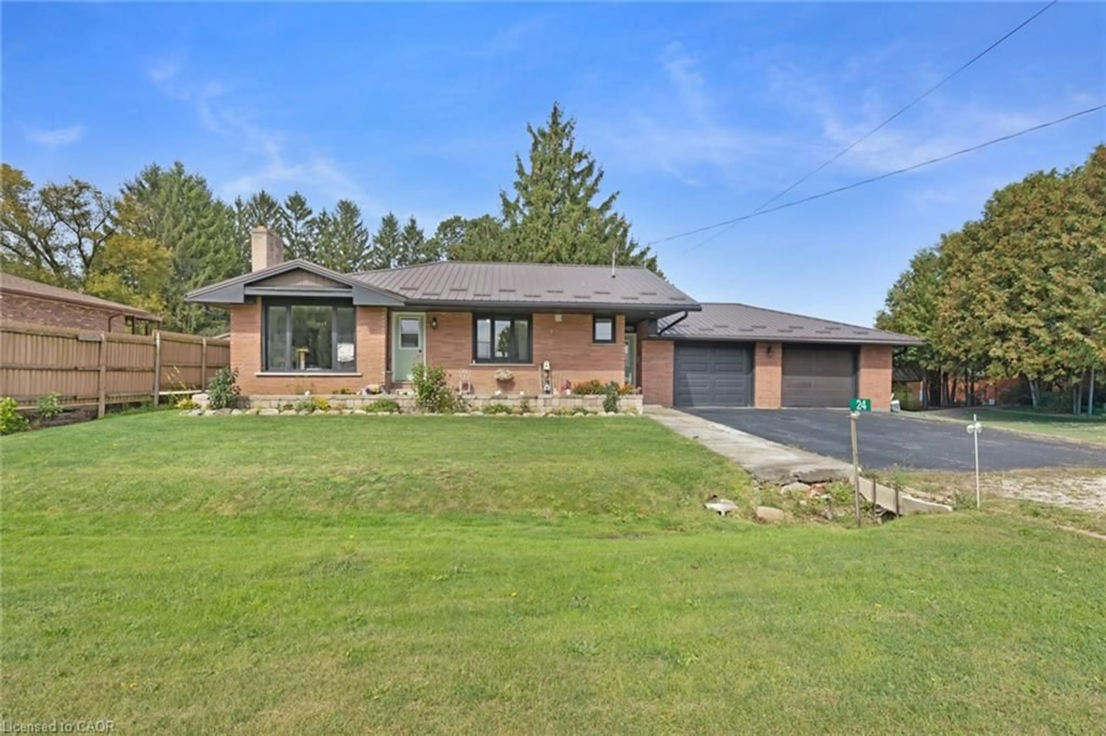 Home with brick exterior material, unknown for 24 Alpha St, Delhi Ontario N4B 1B2