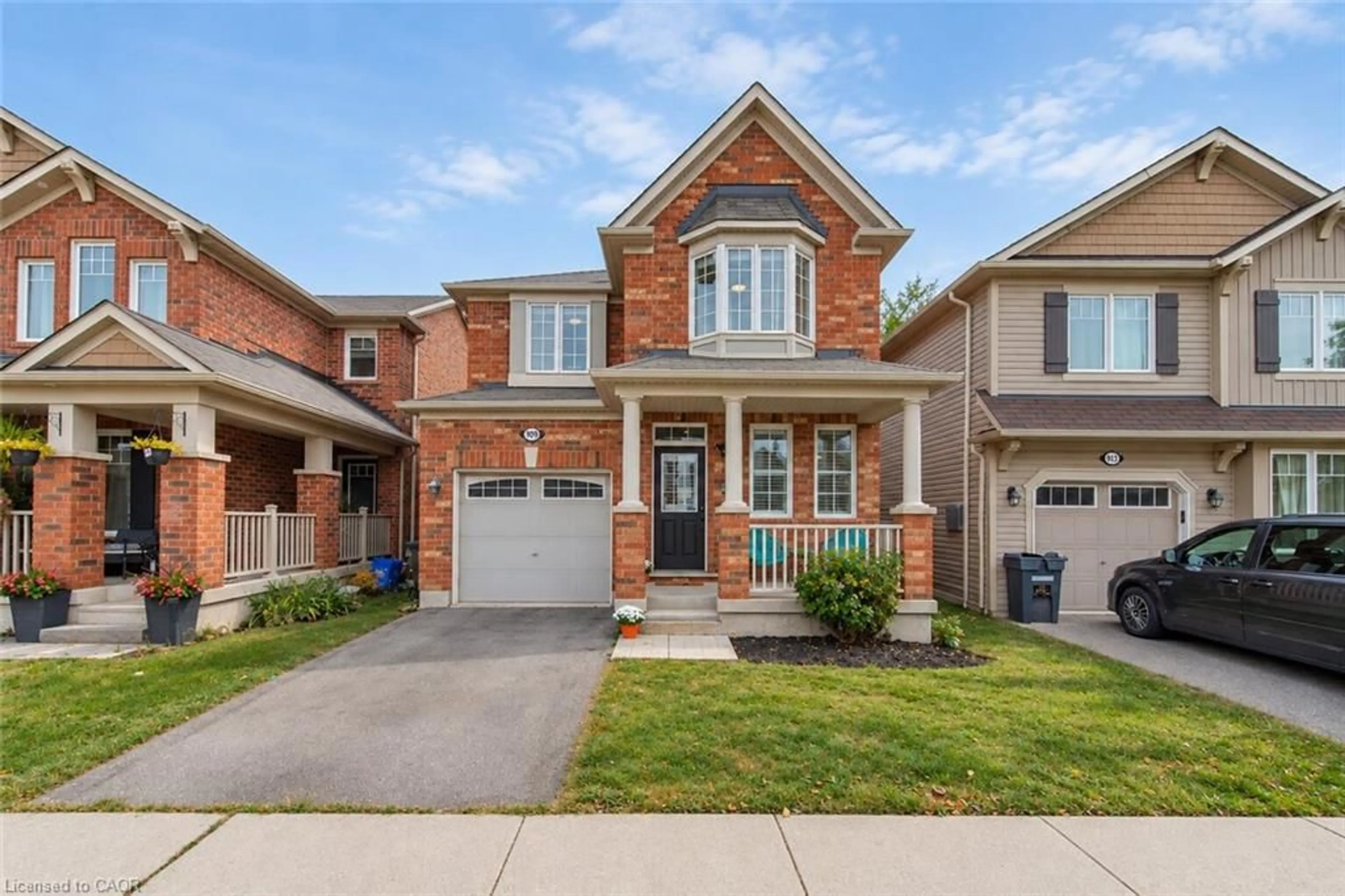Home with brick exterior material, street for 909 Farmstead Dr, Milton Ontario L9T 8J5