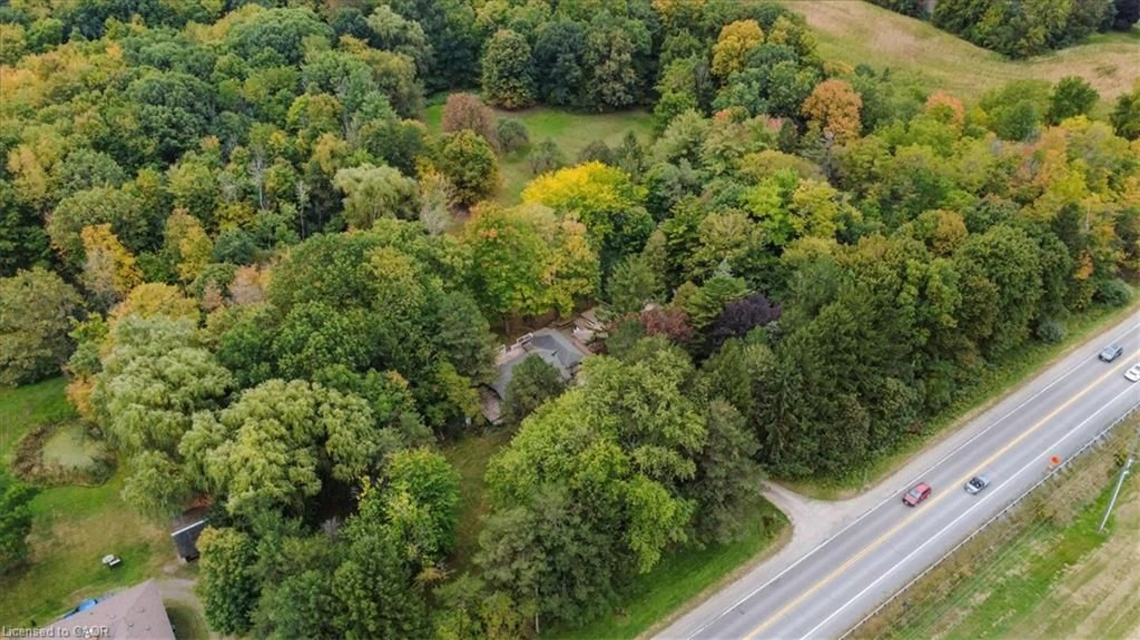 A pic from outside/outdoor area/front of a property/back of a property/a pic from drone, forest/trees view for 912 #5 Hwy, Flamborough Ontario L9H 5E2