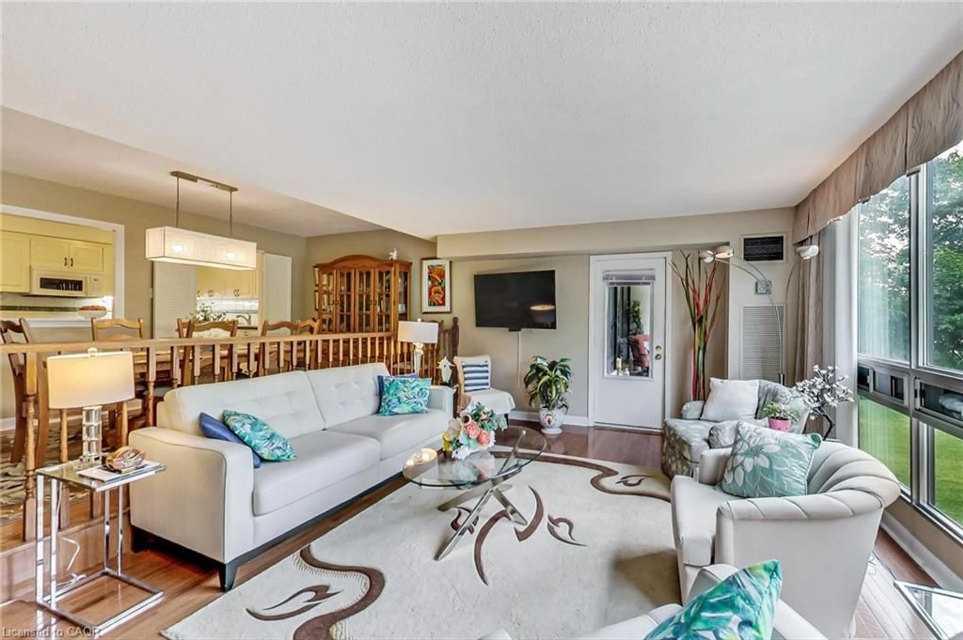 Living room with furniture, unknown for 2185 Marine Dr #202, Oakville Ontario L6L 5L6