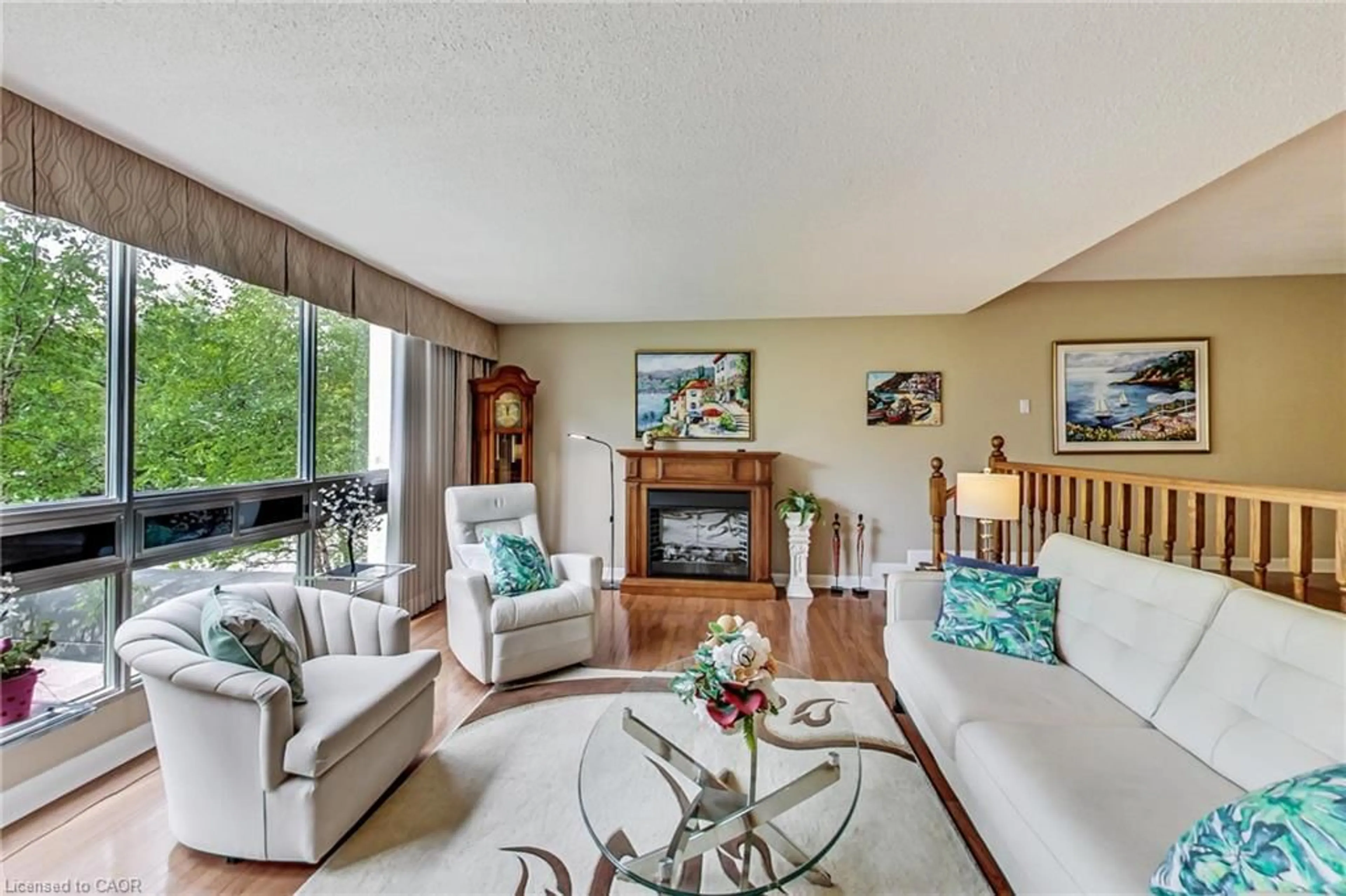Living room with furniture, unknown for 2185 Marine Dr #202, Oakville Ontario L6L 5L6
