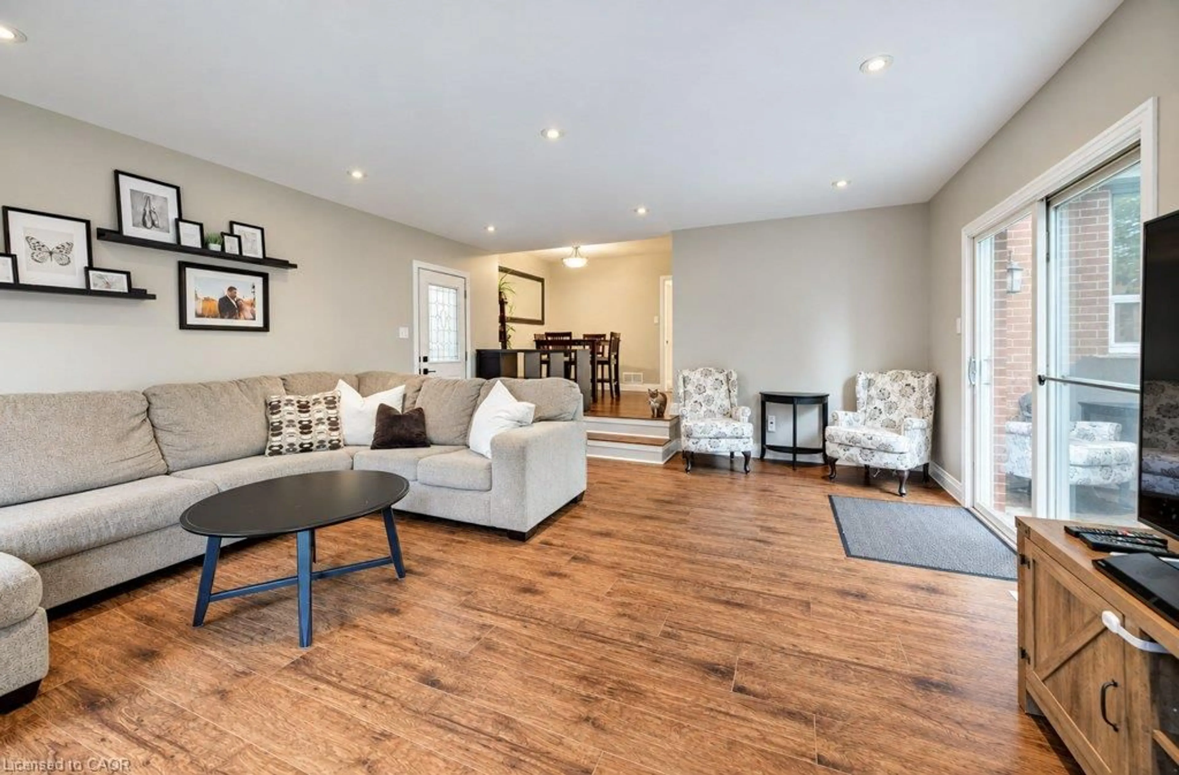 Living room with furniture, wood/laminate floor for 37 Margaret Ave, Waterloo Ontario N2J 3P3