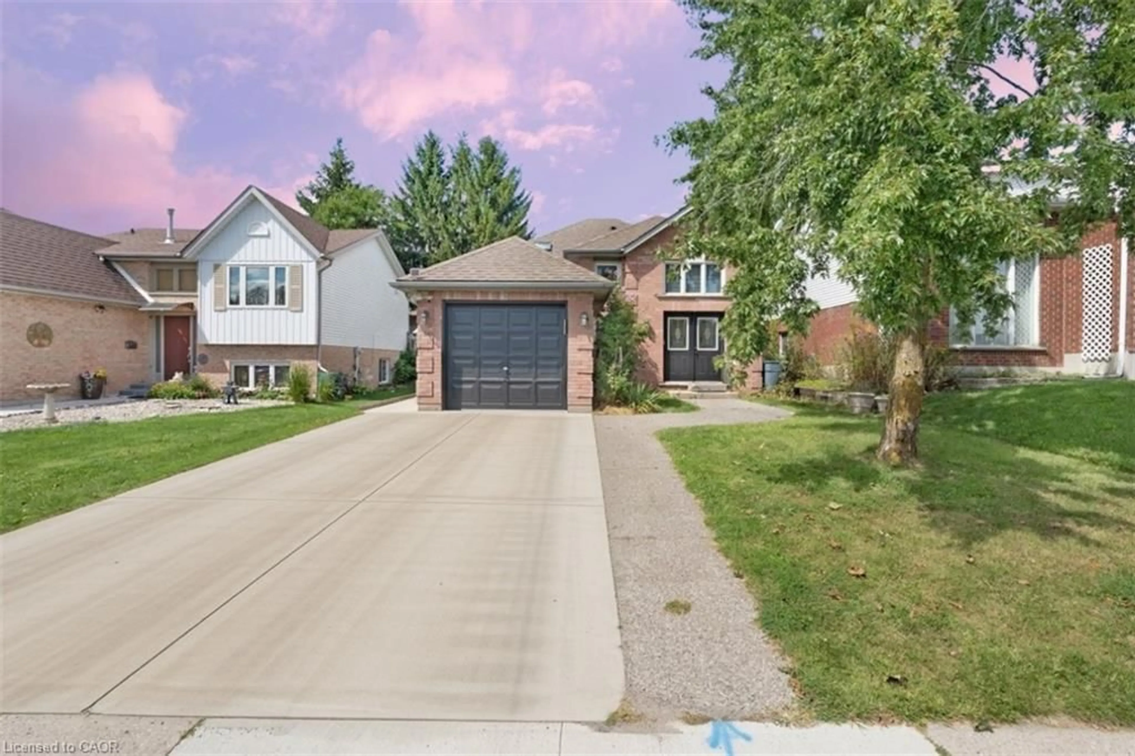 Home with brick exterior material, street for 150 Bankside Dr, Kitchener Ontario N2N 3E4