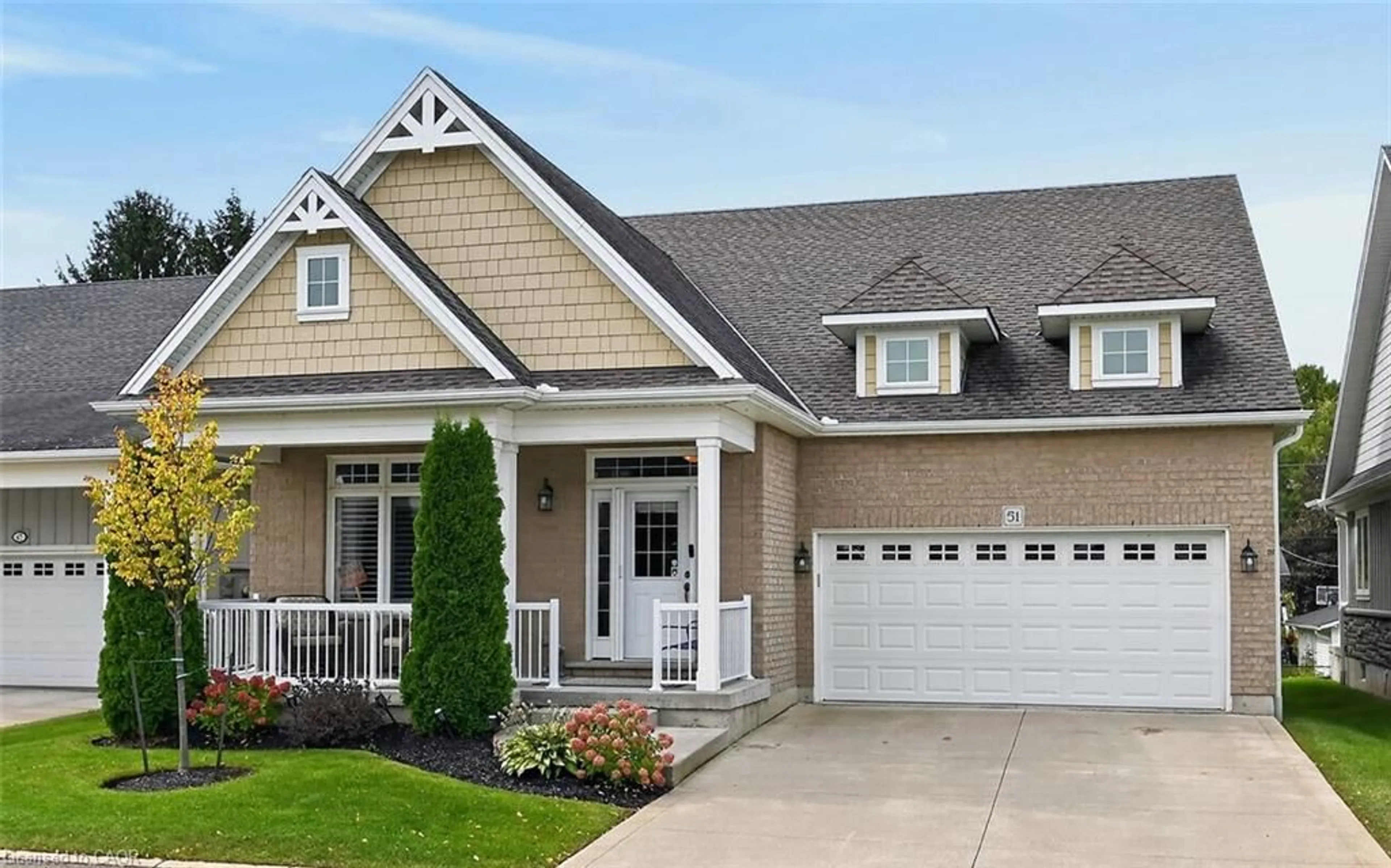 Home with vinyl exterior material, street for 51 Schooner Dr, Port Dover Ontario N0A 1N3