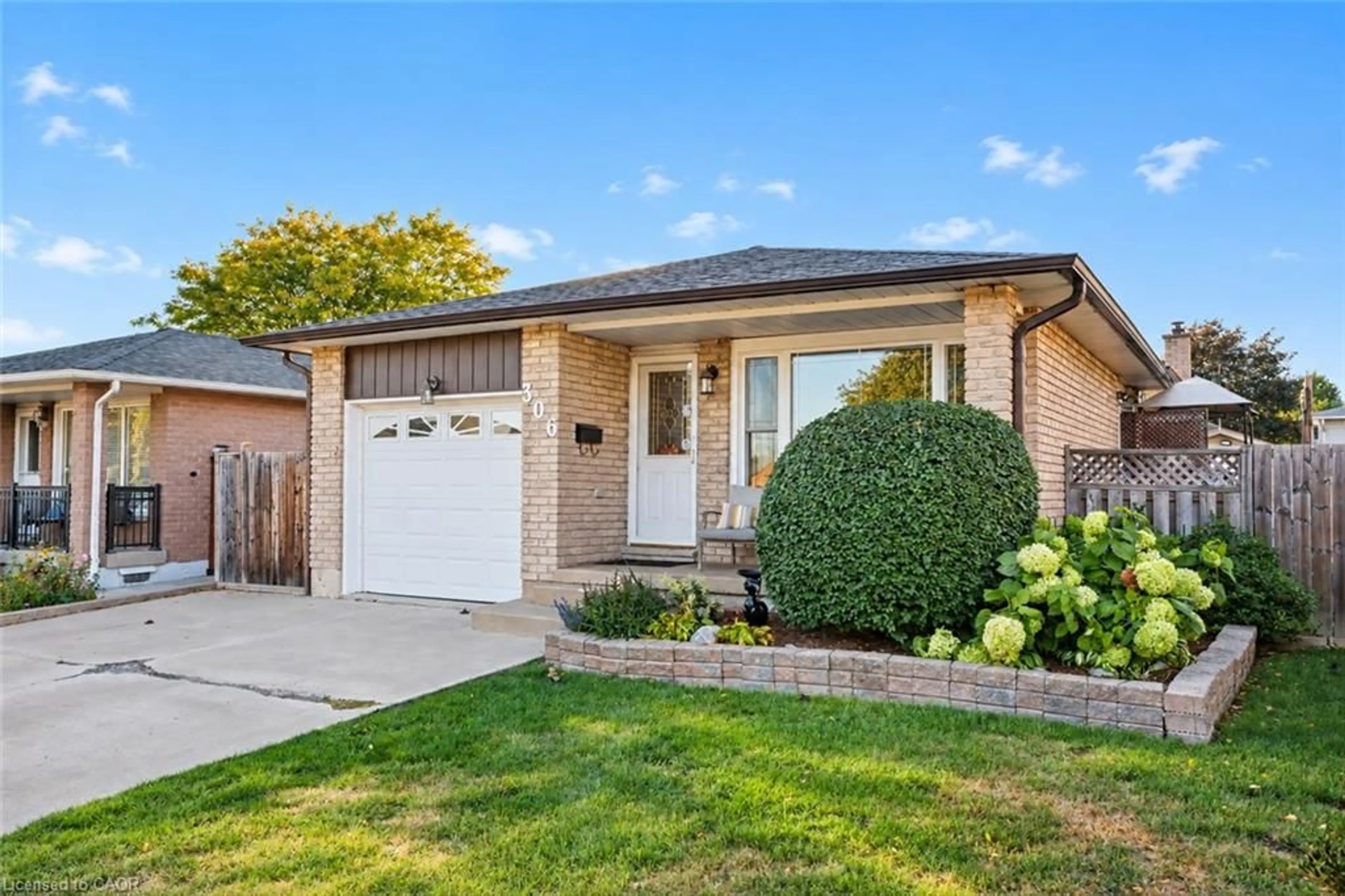 Home with brick exterior material, street for 306 Templemead Dr, Hamilton Ontario L8W 2O5