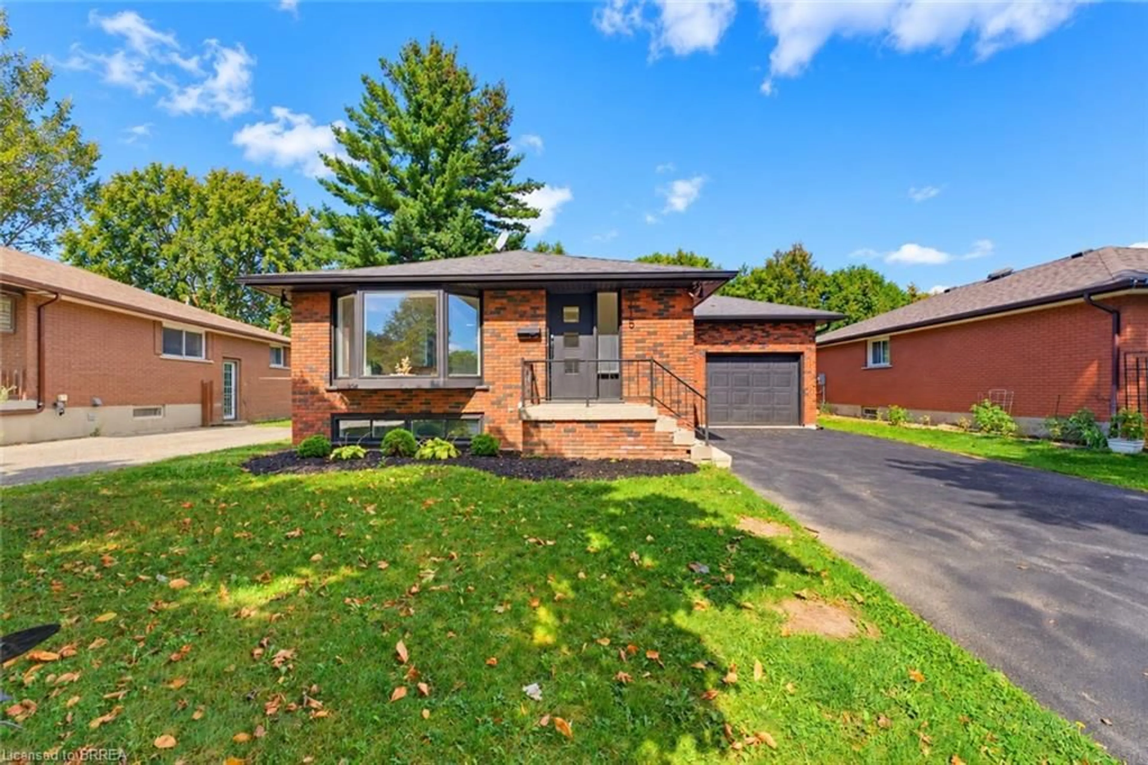 Home with brick exterior material, street for 115 Evelyn St, Brantford Ontario N3R 3H4