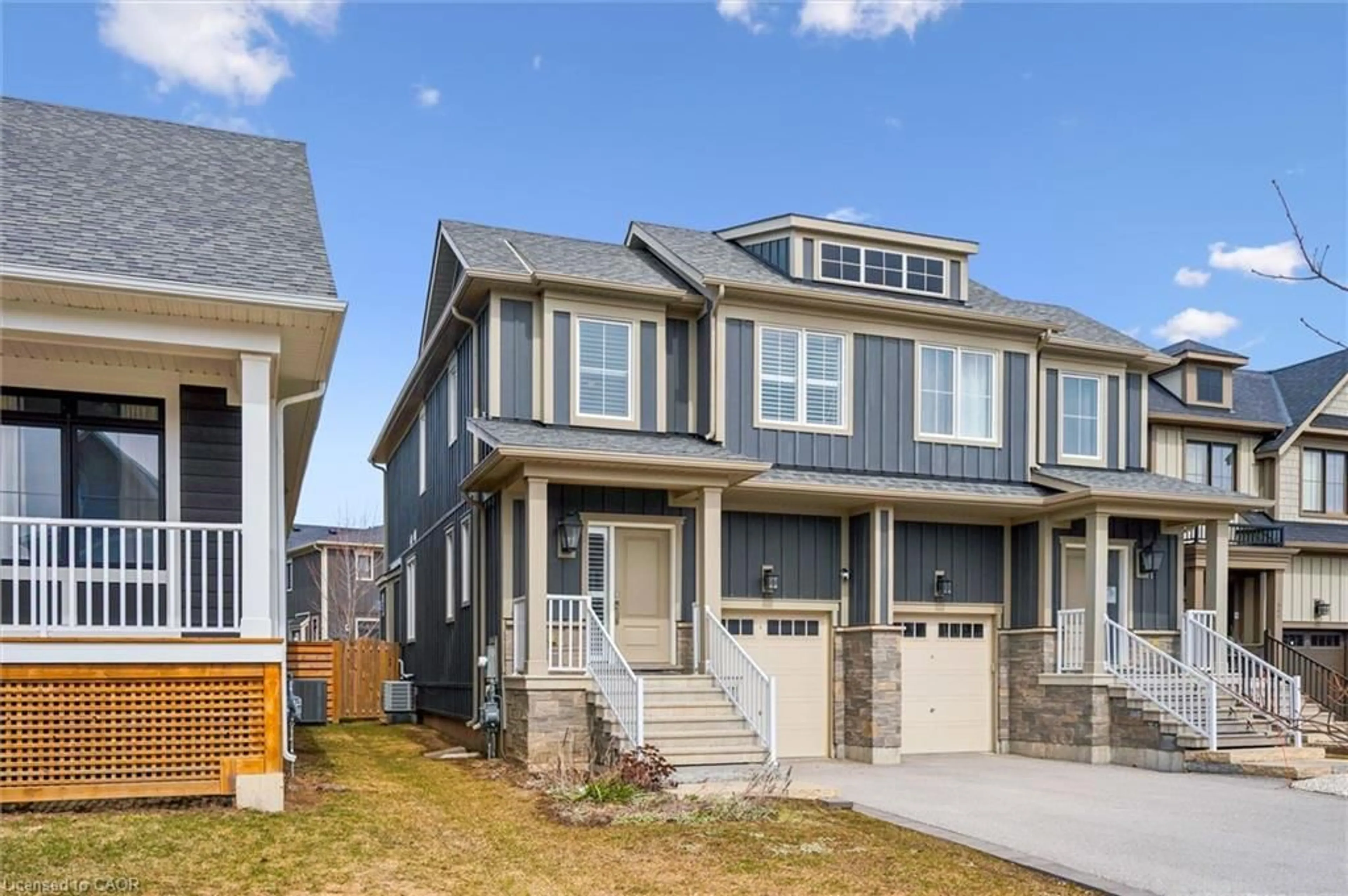 Home with vinyl exterior material, street for 153 Yellow Birch Cres, The Blue Mountains Ontario L9Y 0Y5