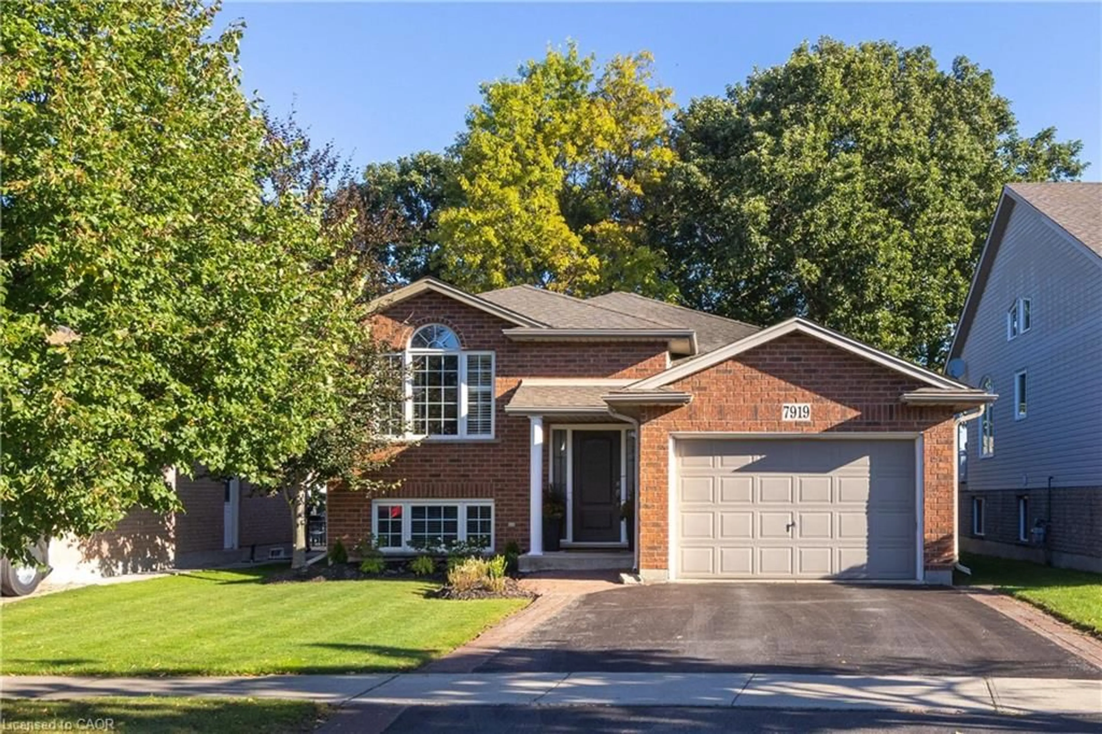 Home with brick exterior material, street for 7919 Fleming Dr, Niagara Falls Ontario L2H 3H9